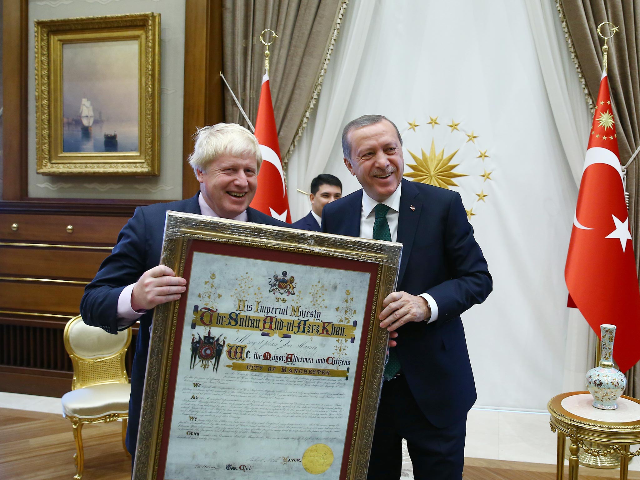 Foreign Secretary Boris Johnson (left) was relieved that President Recep Tayyip Erdogan (right) did not hold the poem against him