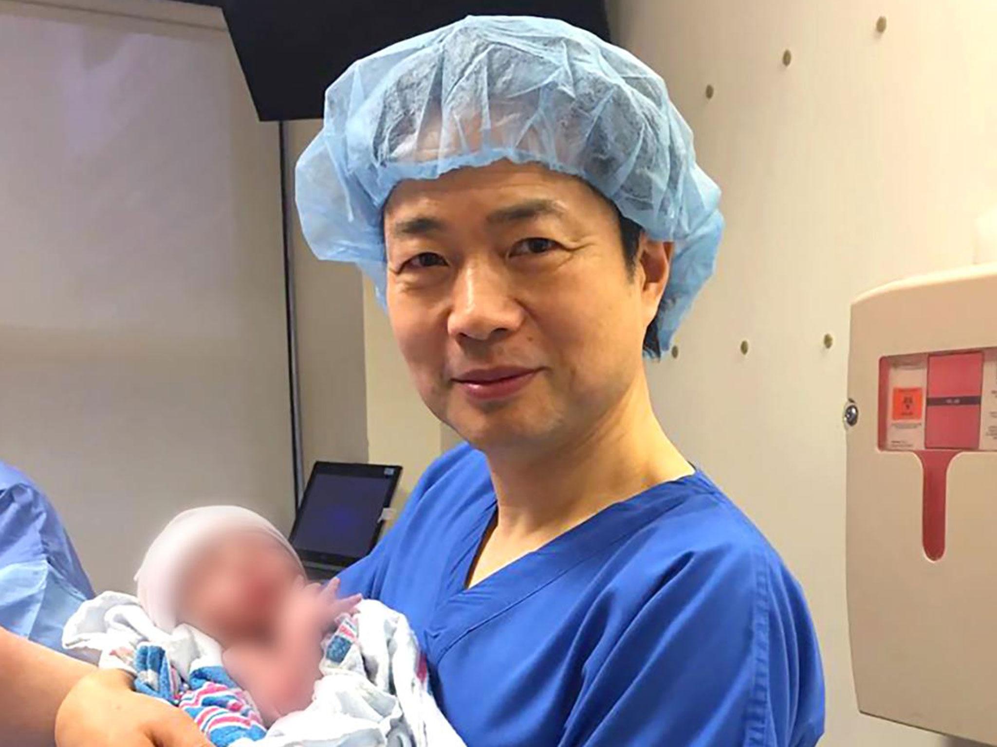 &#13;
Dr John Zhang with the baby in Mexico shortly after he was born &#13;