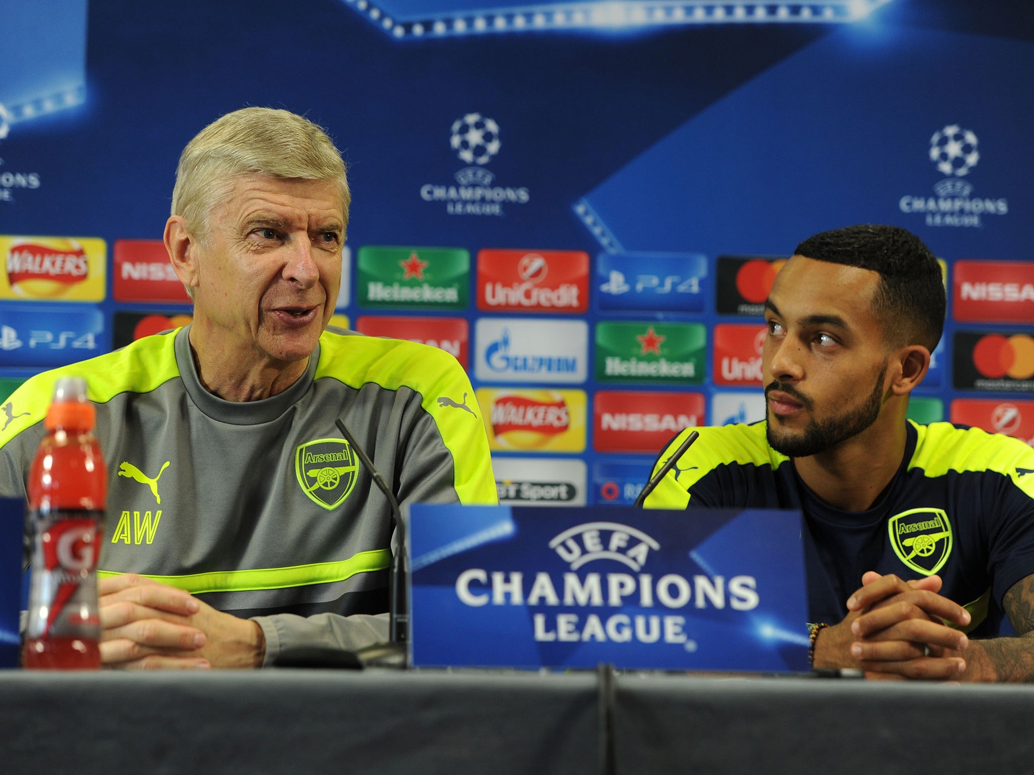 Wenger and Walcott taking questions at Tuesday's press conference