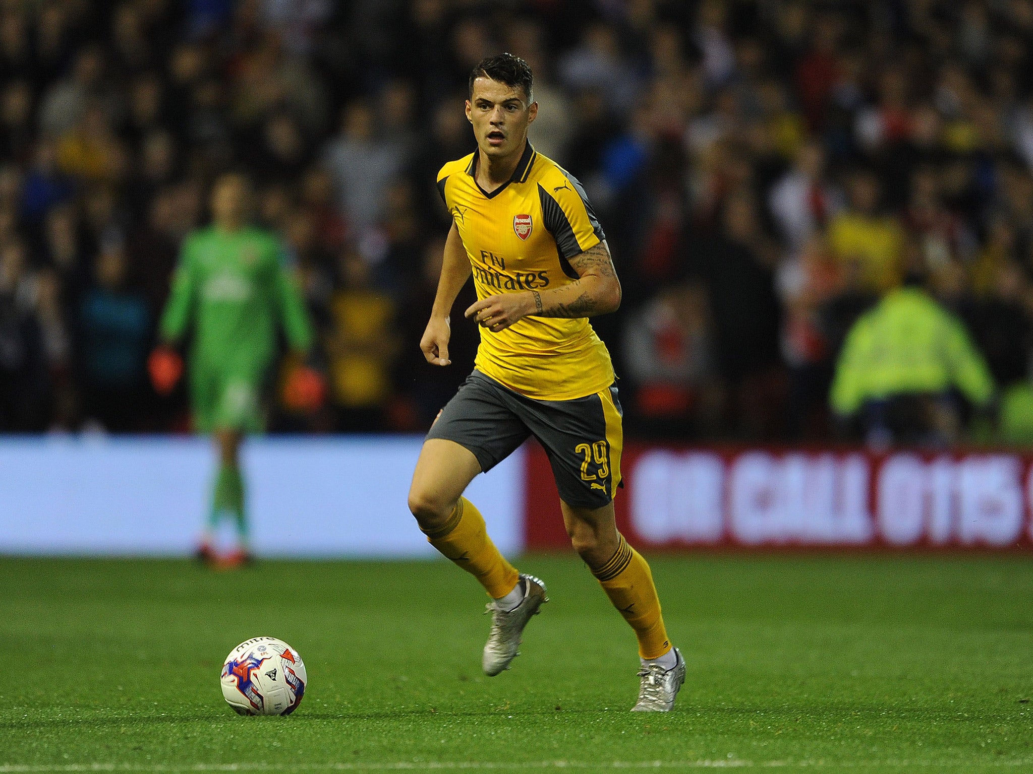 Granit Xhaka wear sport the Arsenal away strip against Basel on Wednesday night