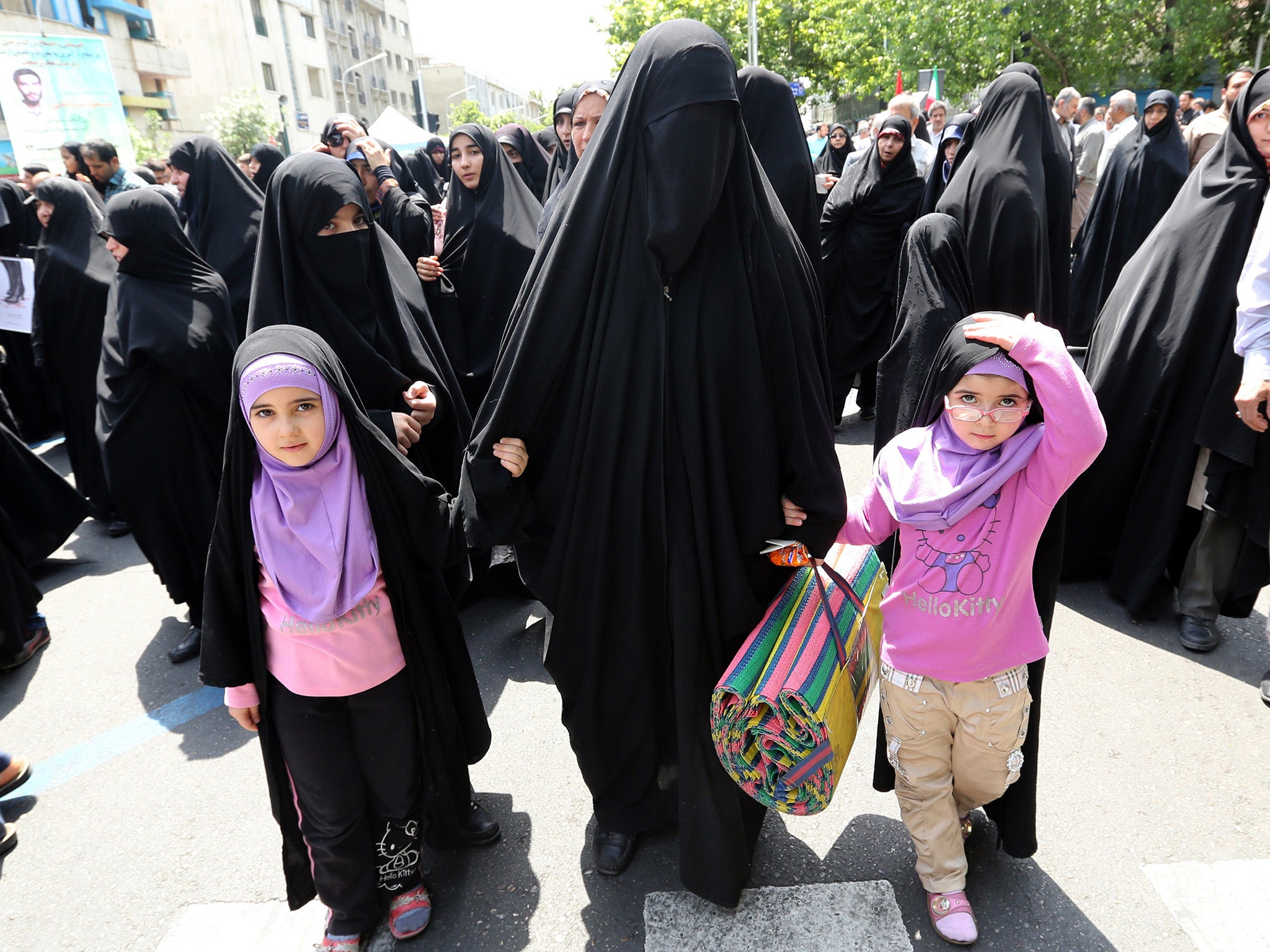 Wearing the Islamic headscarf is compulsory in public for all women in Iran