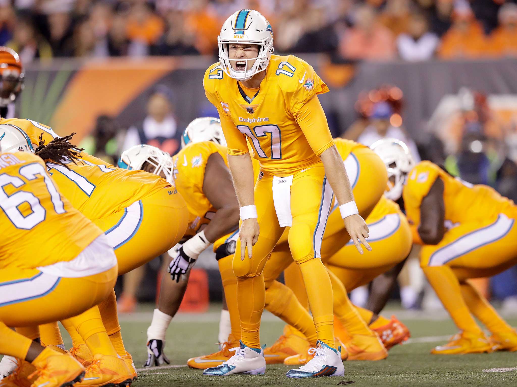 Ryan Tannehill calls a play at the line of scrimmage