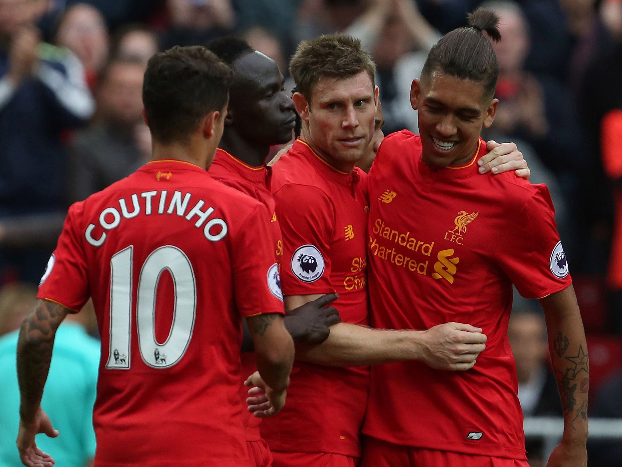 Liverpool celebrate scoring against Hull City