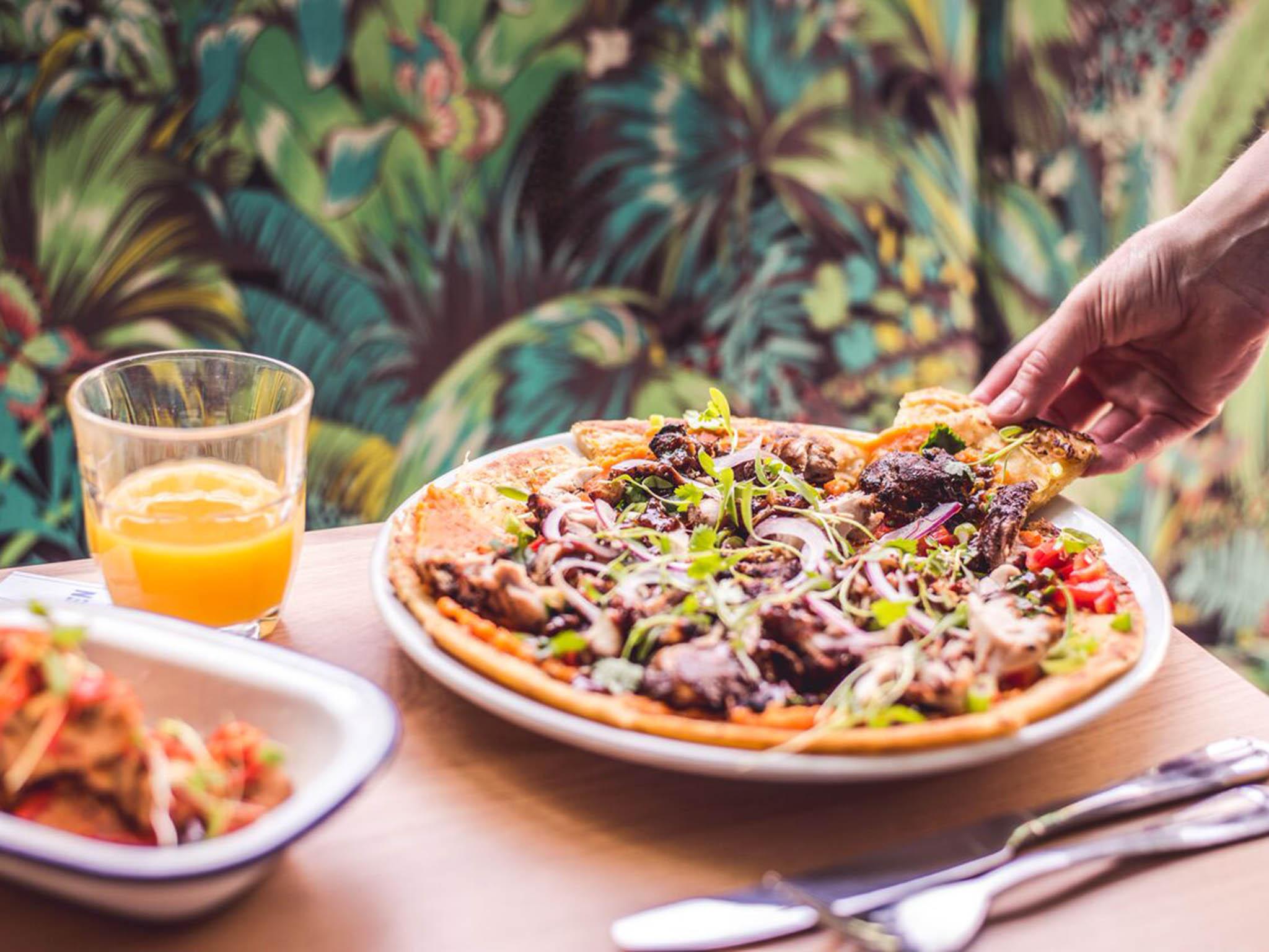 The ‘buss up shut’ roti pizza with jerk chicken &amp; sweet potato