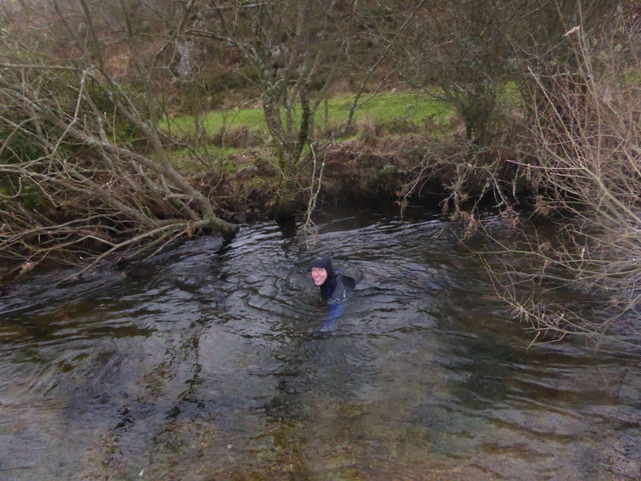 Charles living as an otter, swimming in the rivers of Exmoor