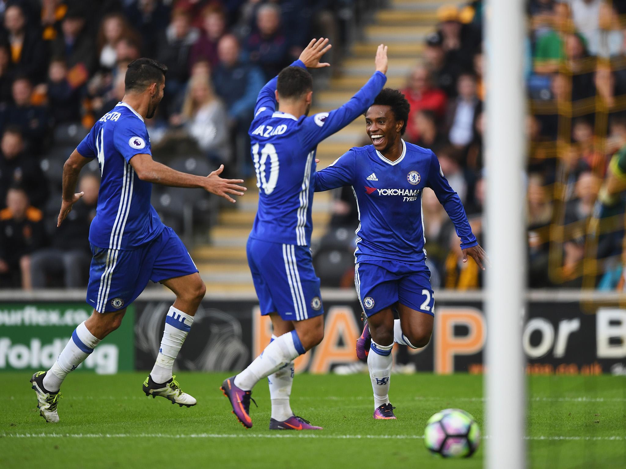 Willian is congratulated by his team-mates at the KCOM Stadium