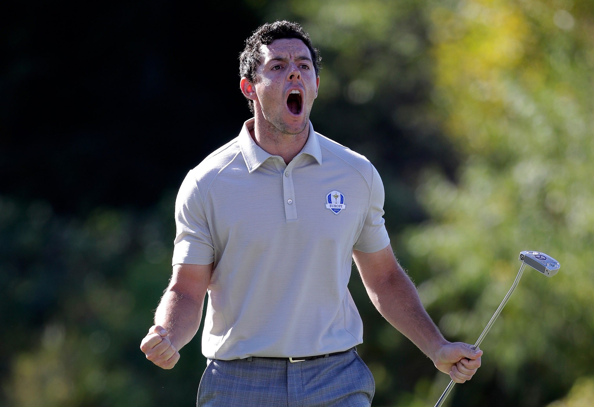 Rory McIlroy roars with delight after halving the tenth hole