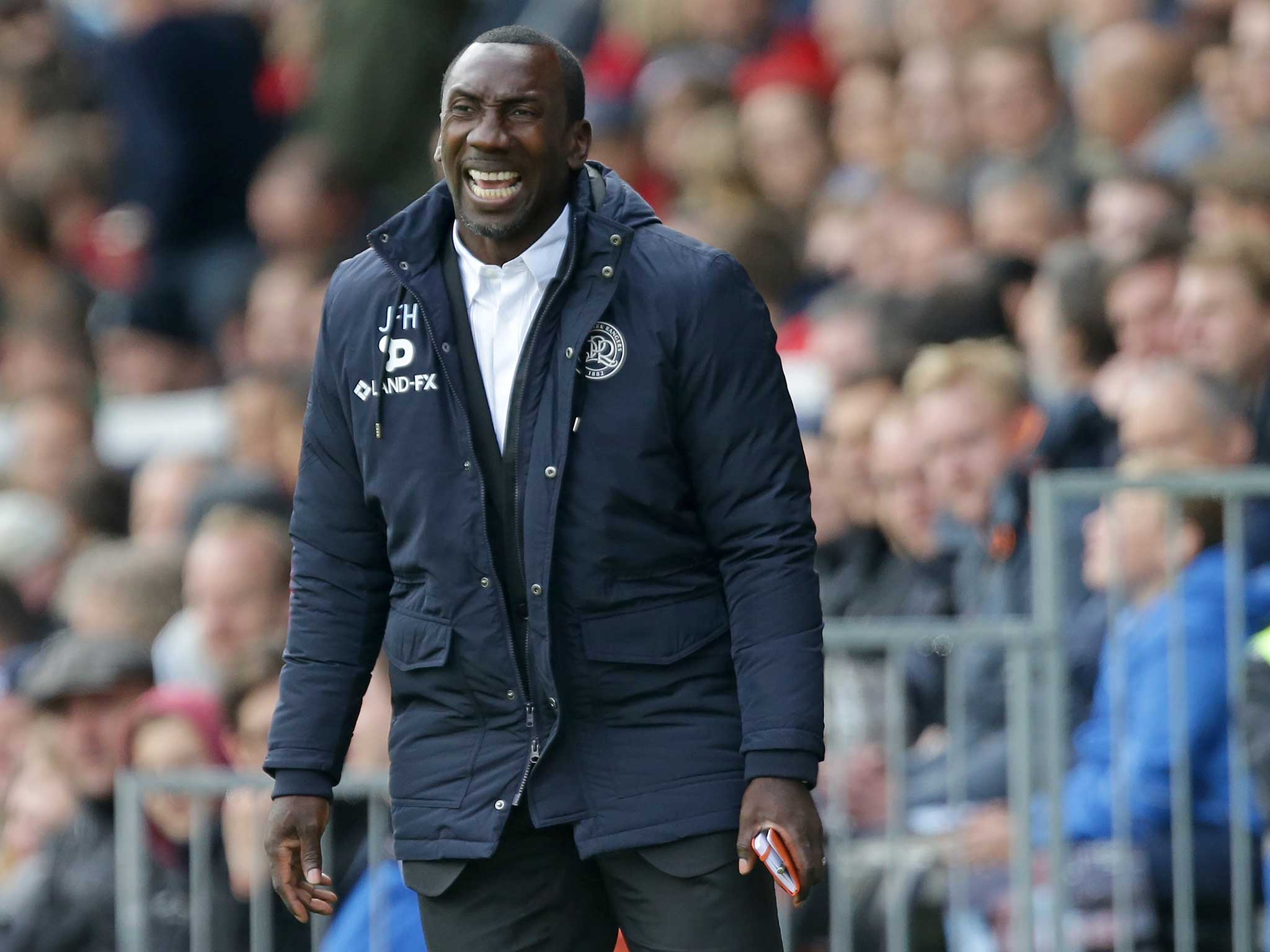 Jimmy Floyd Hasselbaink watches on during Queens Park Rangers' win against Fulham