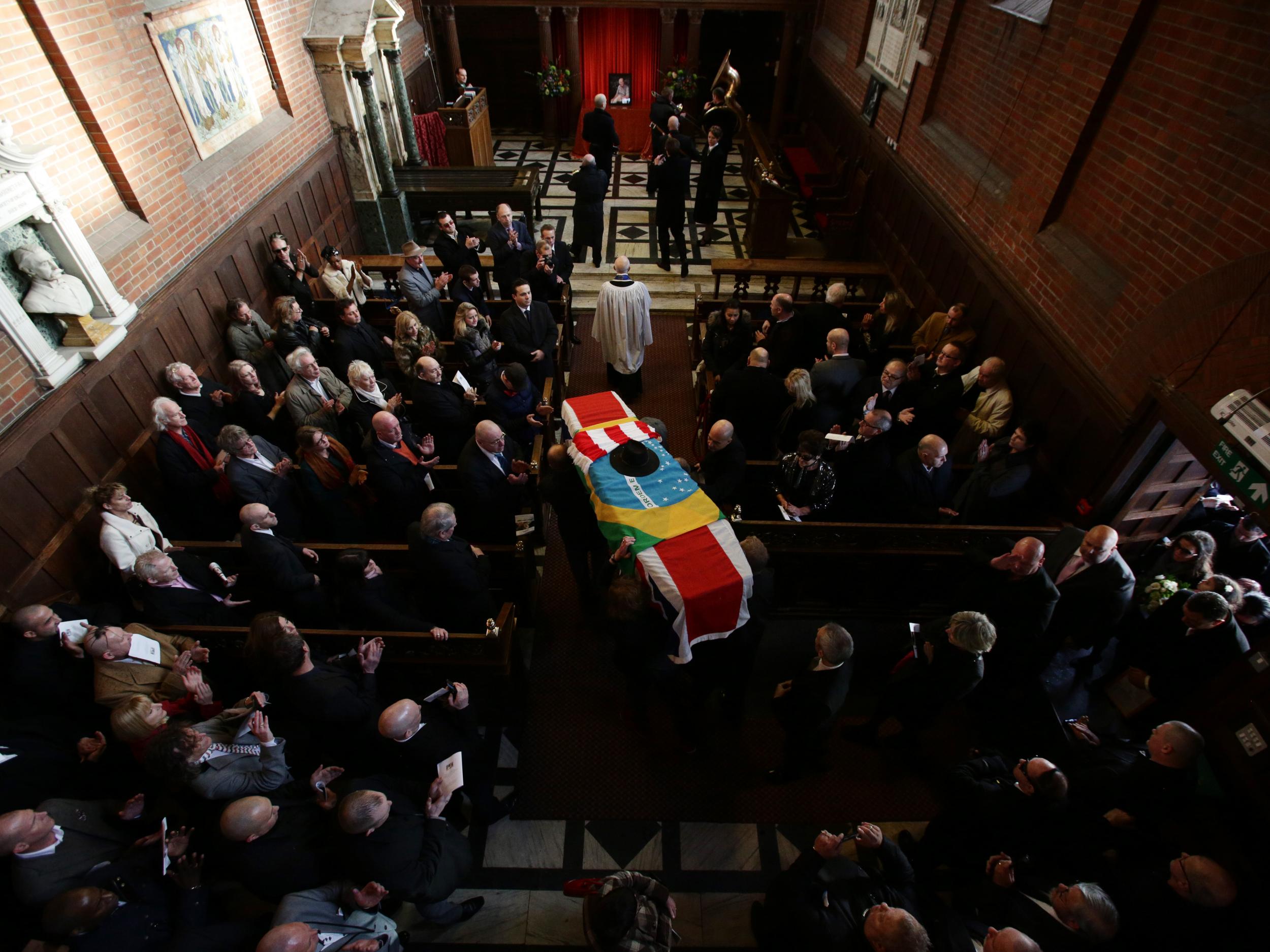 In order to live-stream a funeral, a digital camera is installed discreetly in a crematorium chapel