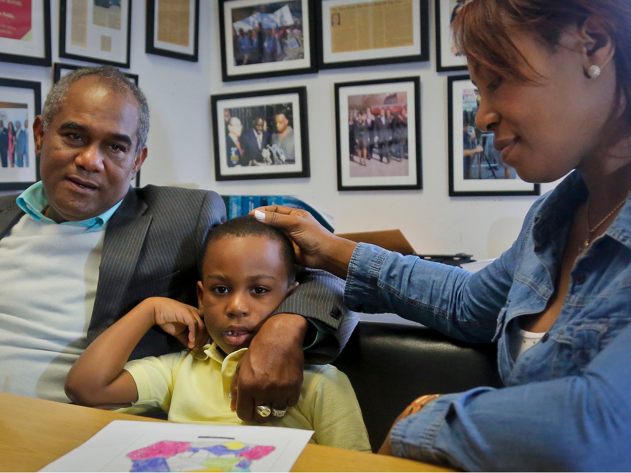 JetBlue Airways sent Andy Martinez (centre) to the wrong airport and presented his mother, Maribel (right) with a different boy.