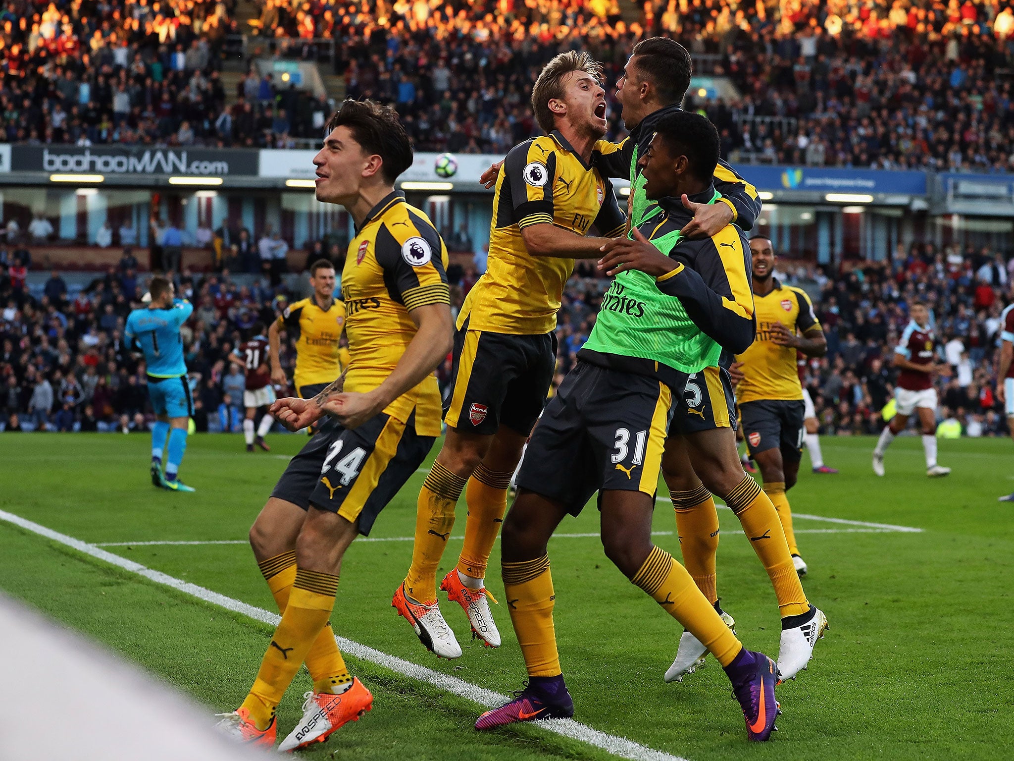 Arsenal celebrate Laurent Koscielny's late goal