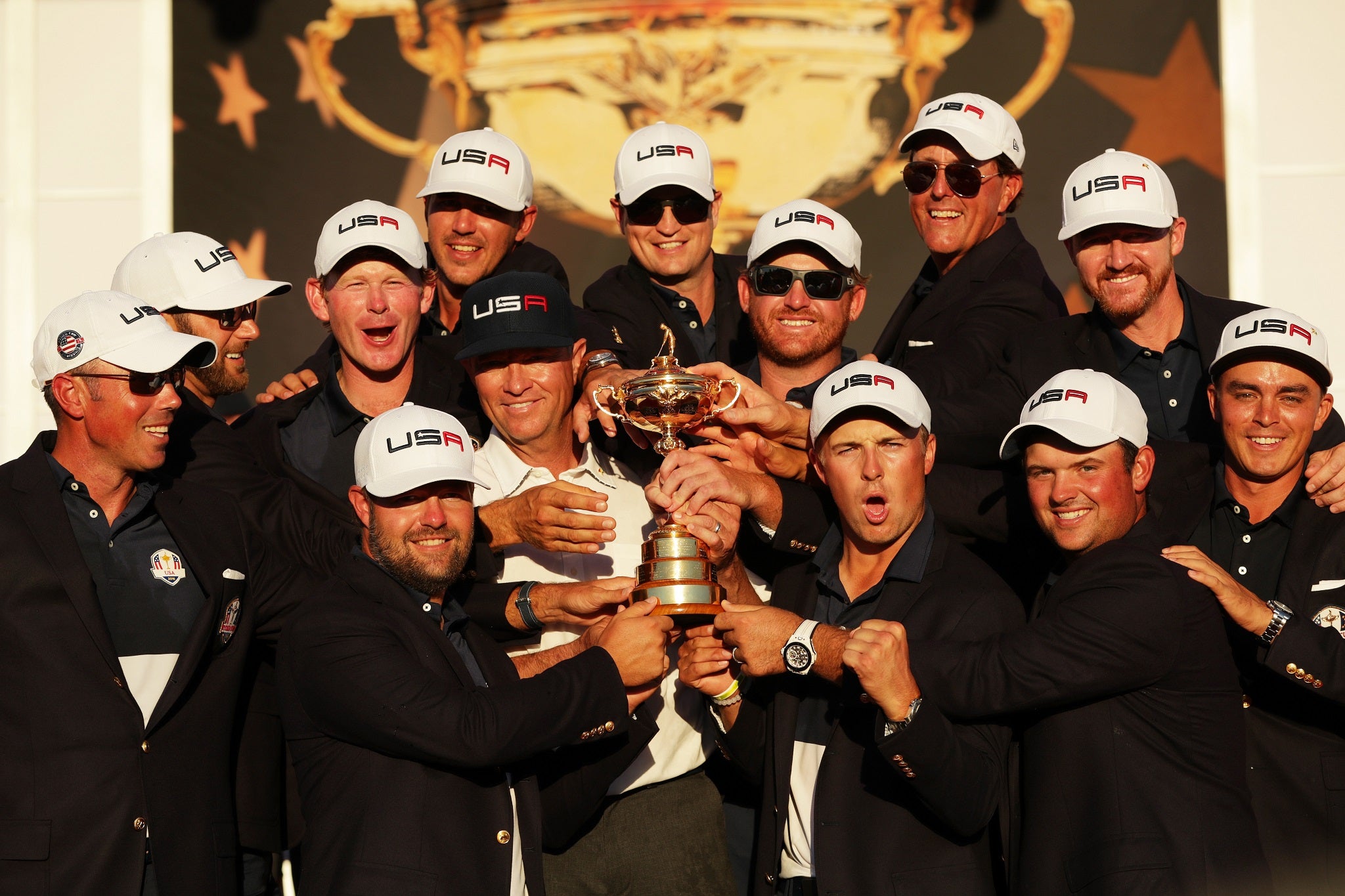 &#13;
The American Ryder Cup team celebrate their victory at Hazeltine last year &#13;