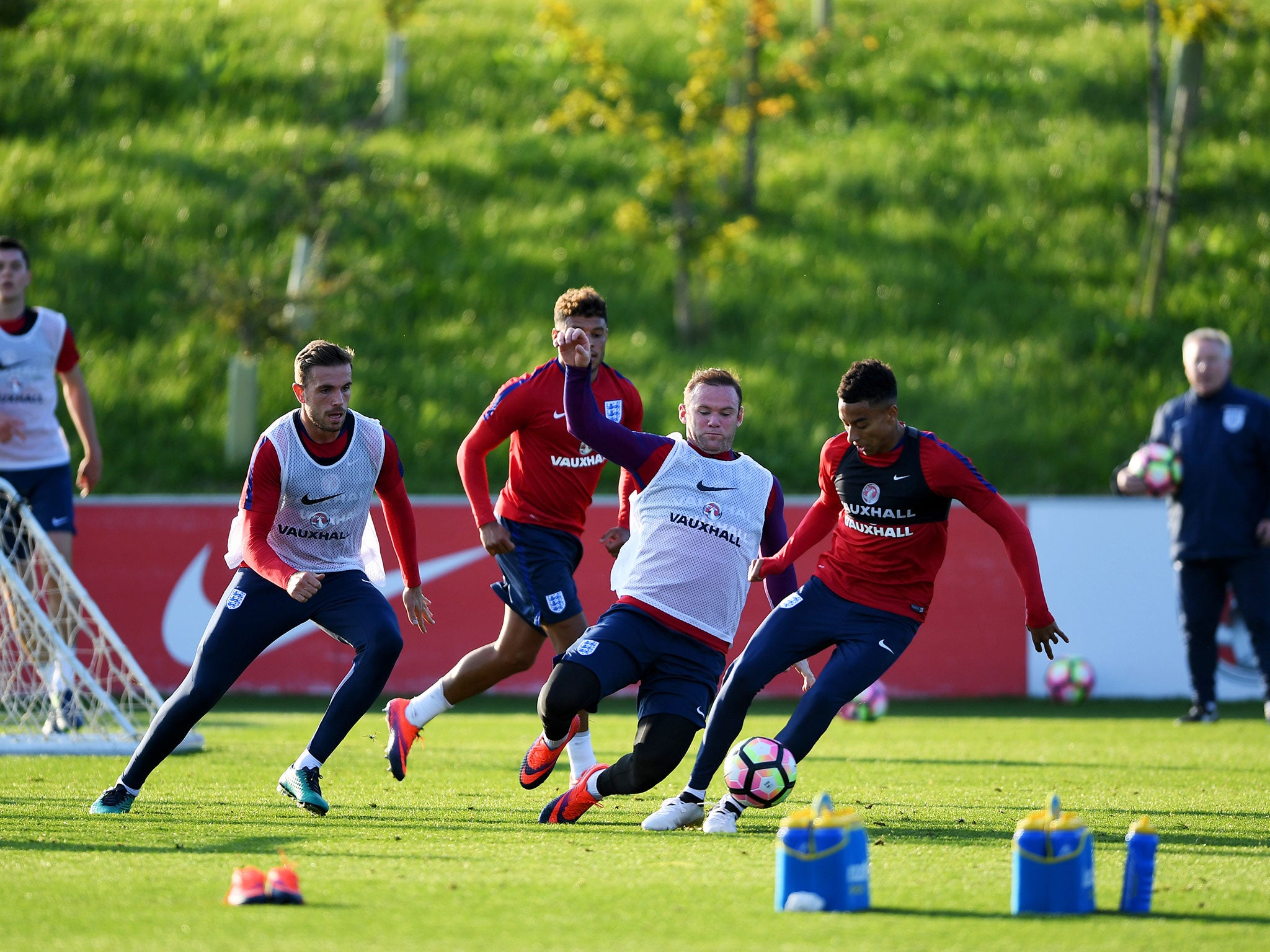 Wayne Rooney throws himself into training with the England squad