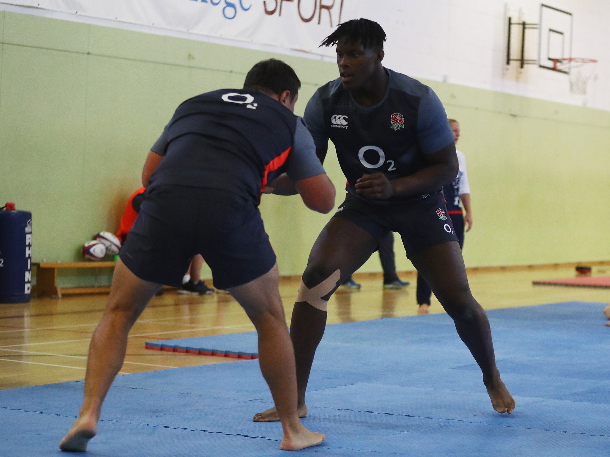 Jones was wrestling Maro Itoje (right) when the injury occurred