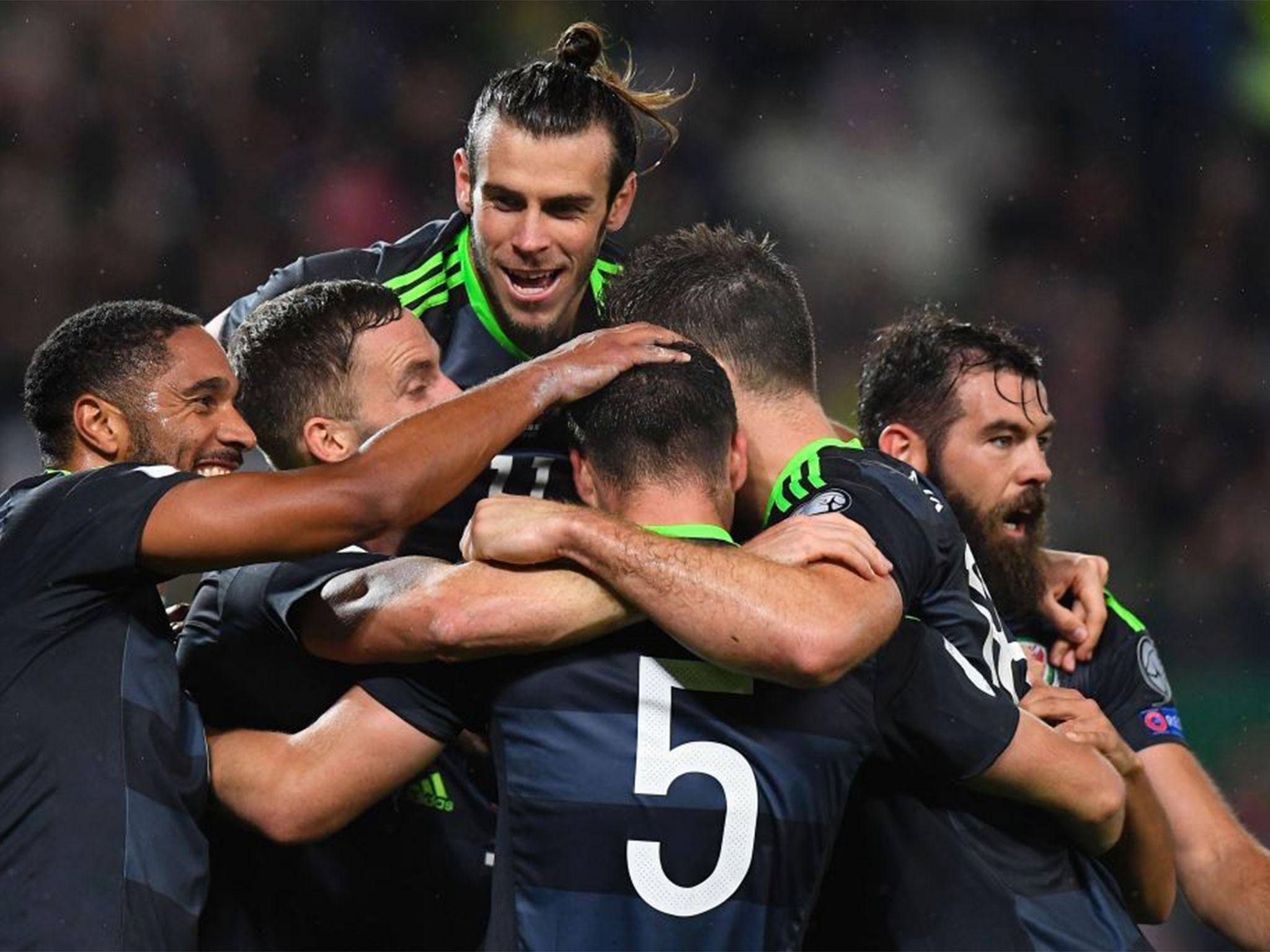 Wales celebrate their second goal in Vienna