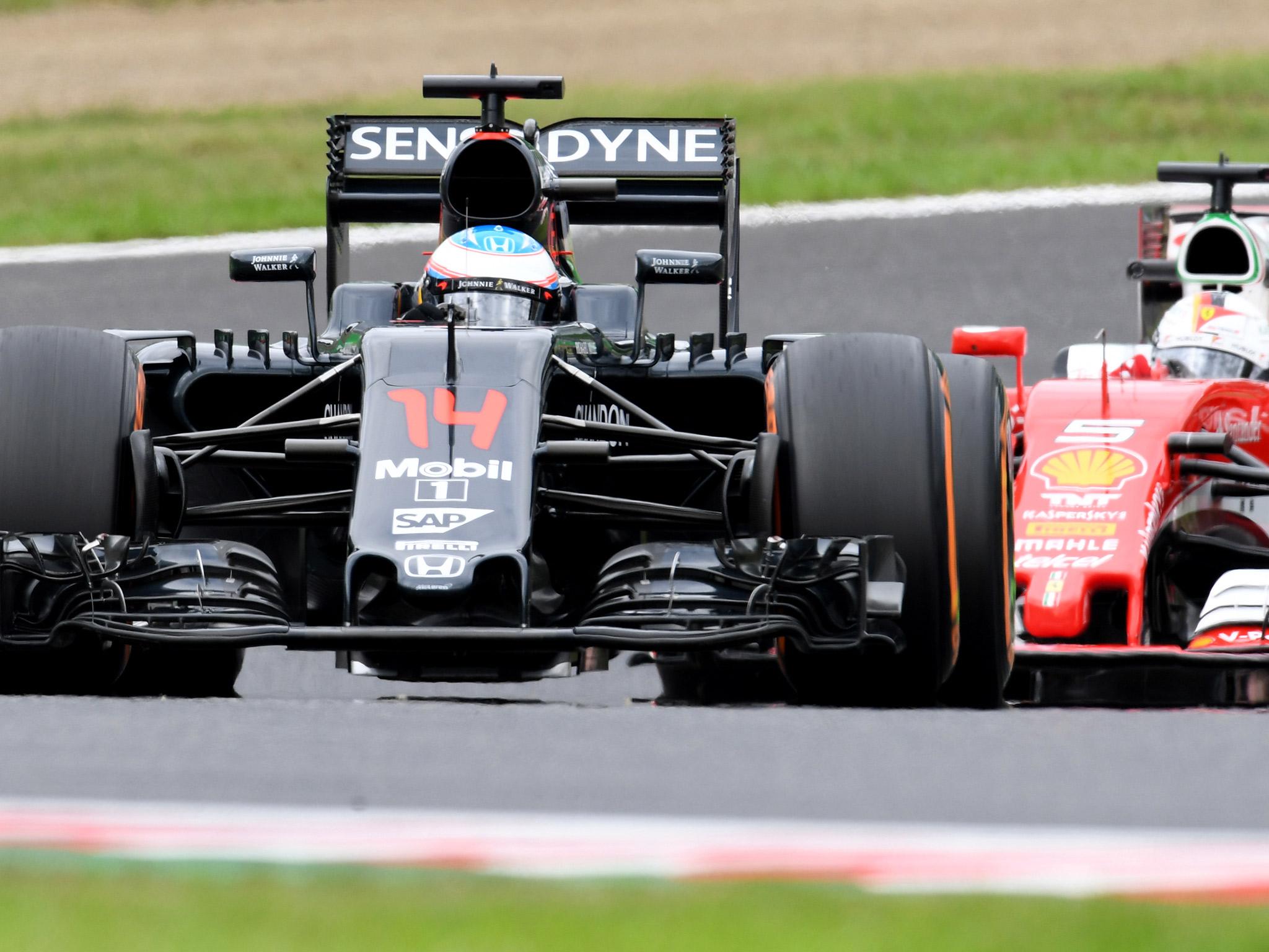 &#13;
Alonso engaged in some early wheel-to-wheel running with Sebastian Vettel &#13;