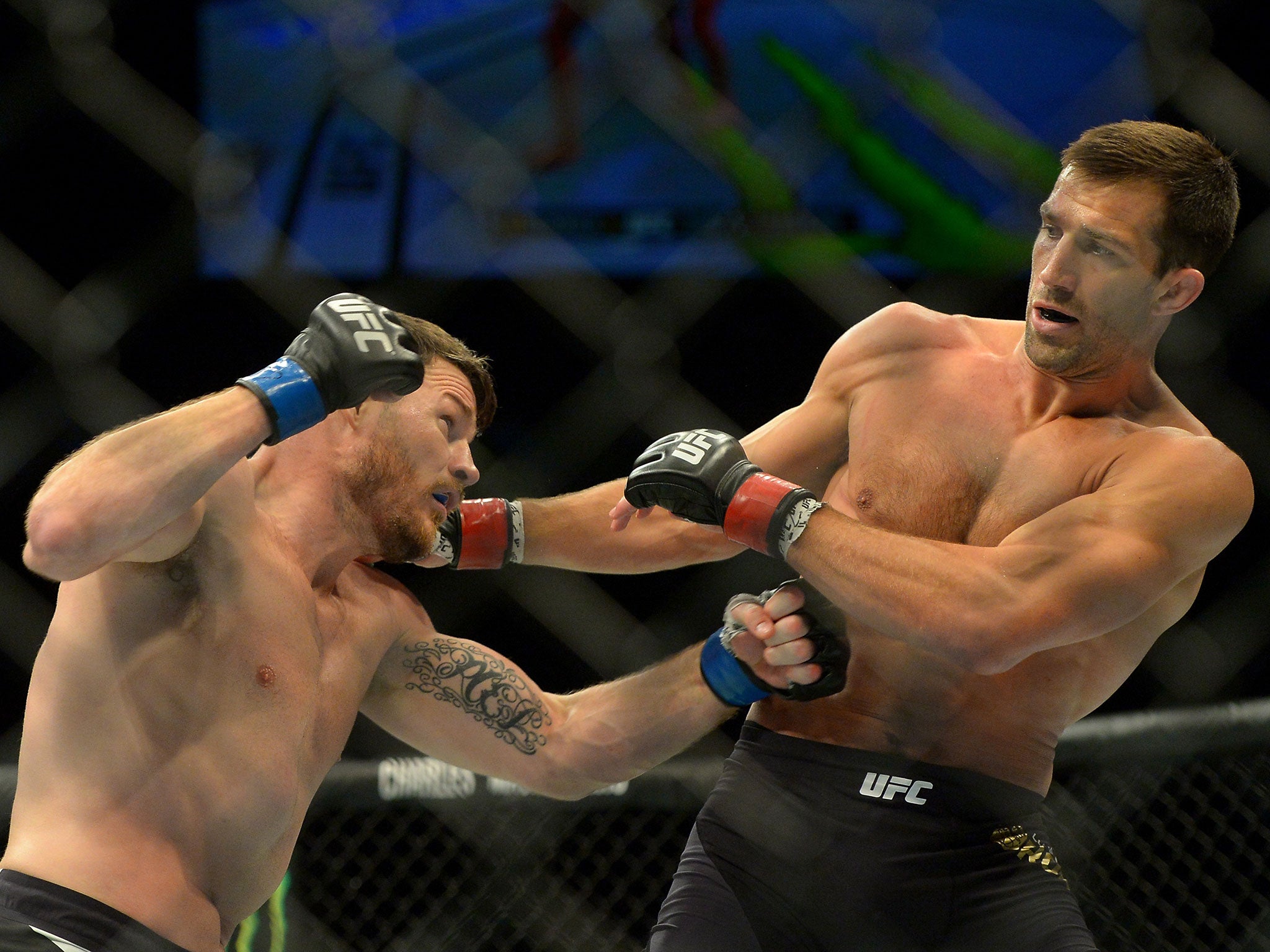 Michael Bisping and Luke Rockhold during their middleweight championship bout at UFC 199 at The Forum on June 4, 2016 in Inglewood, California