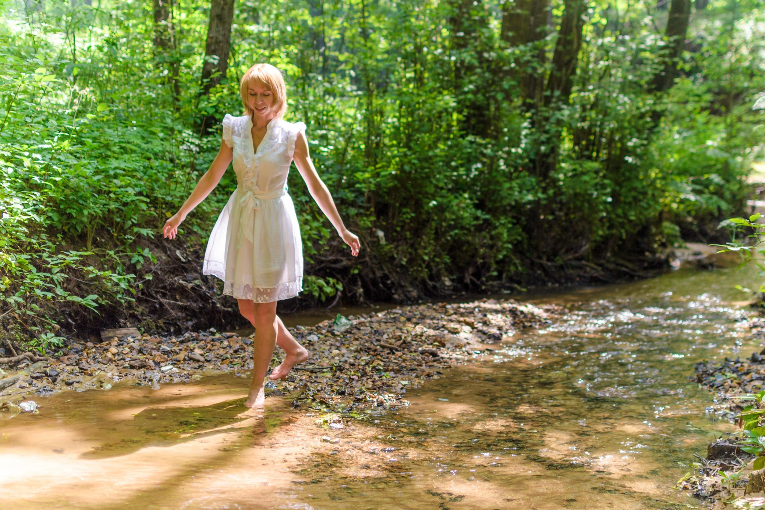 Is this lady walking or forest bathing? Answers on a postcard, please