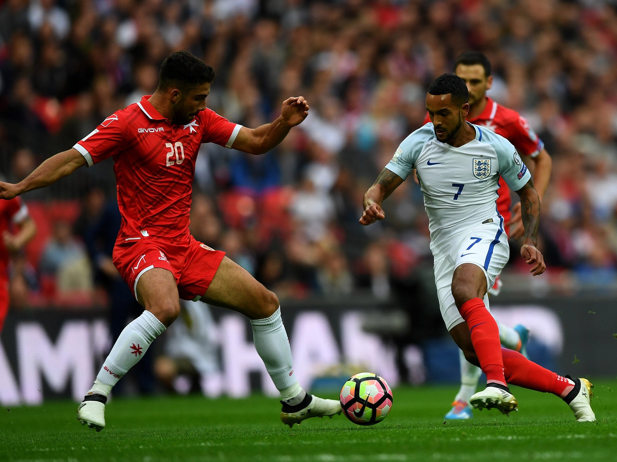 Theo Walcott in action during the early stages of England's World Cup qualifier against Malta