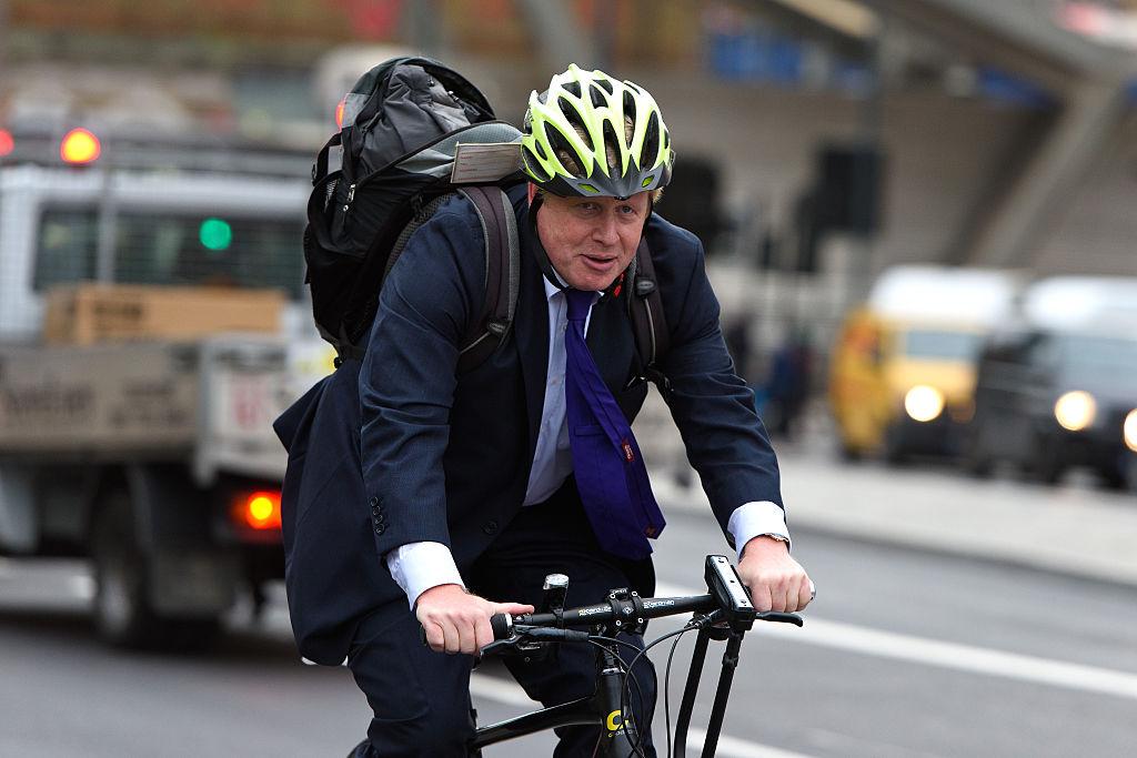 Boris Johnson on his bike ( Ben Pruchnie/Getty Images)