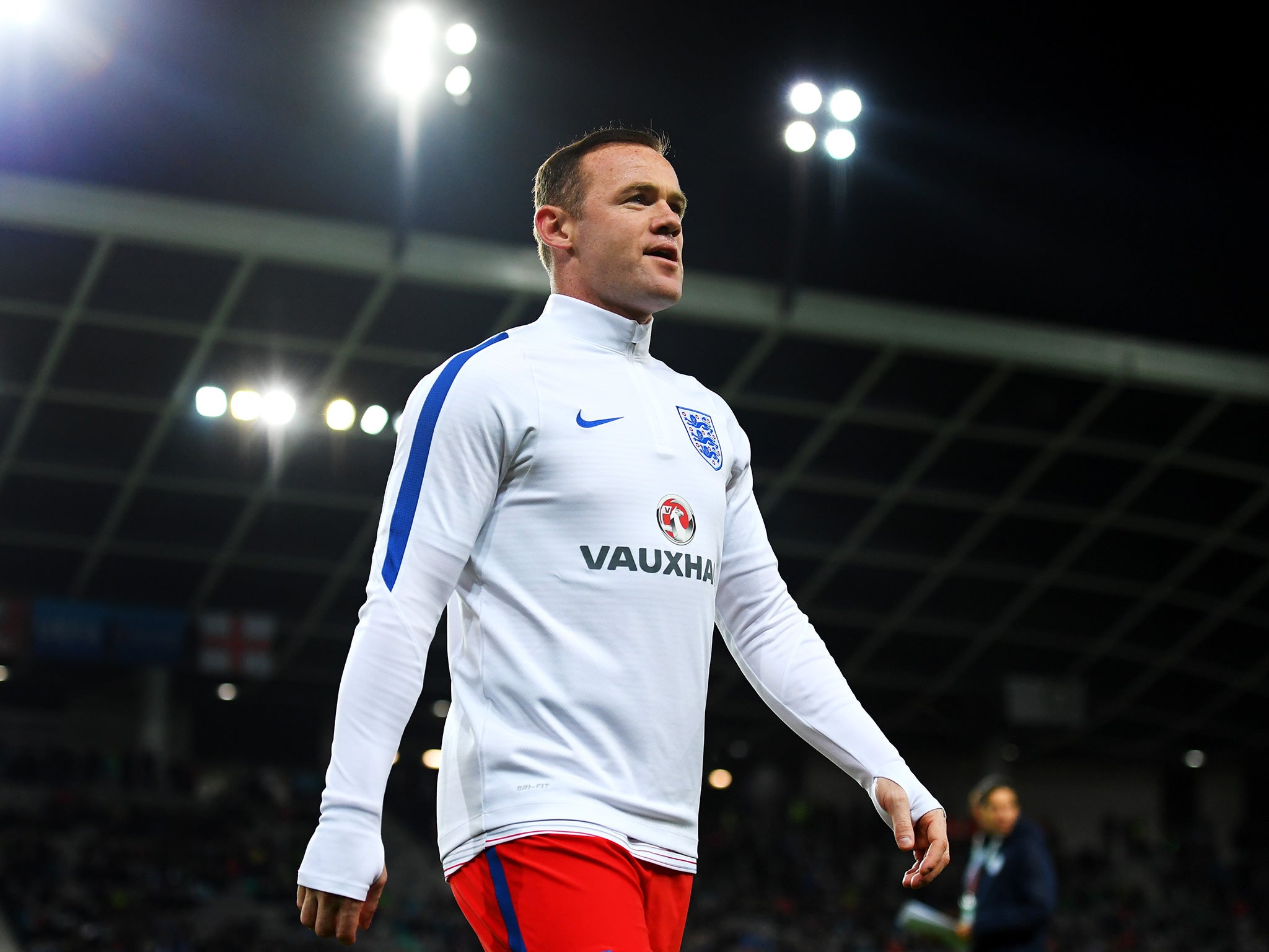 Rooney, who started on the bench, on the pitch before kick-off