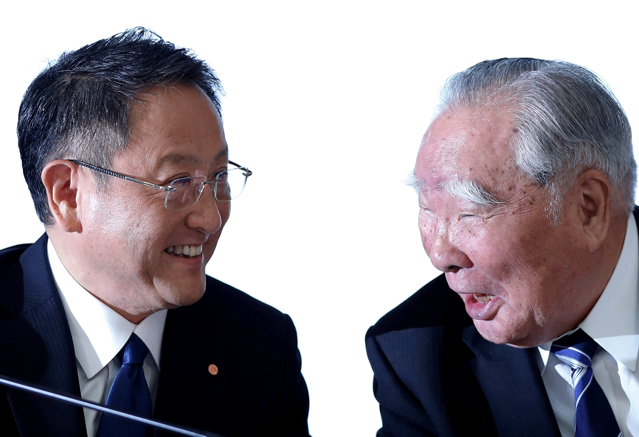 Toyota president Akio Toyoda and Suzuki chairman Osamu Suzuki