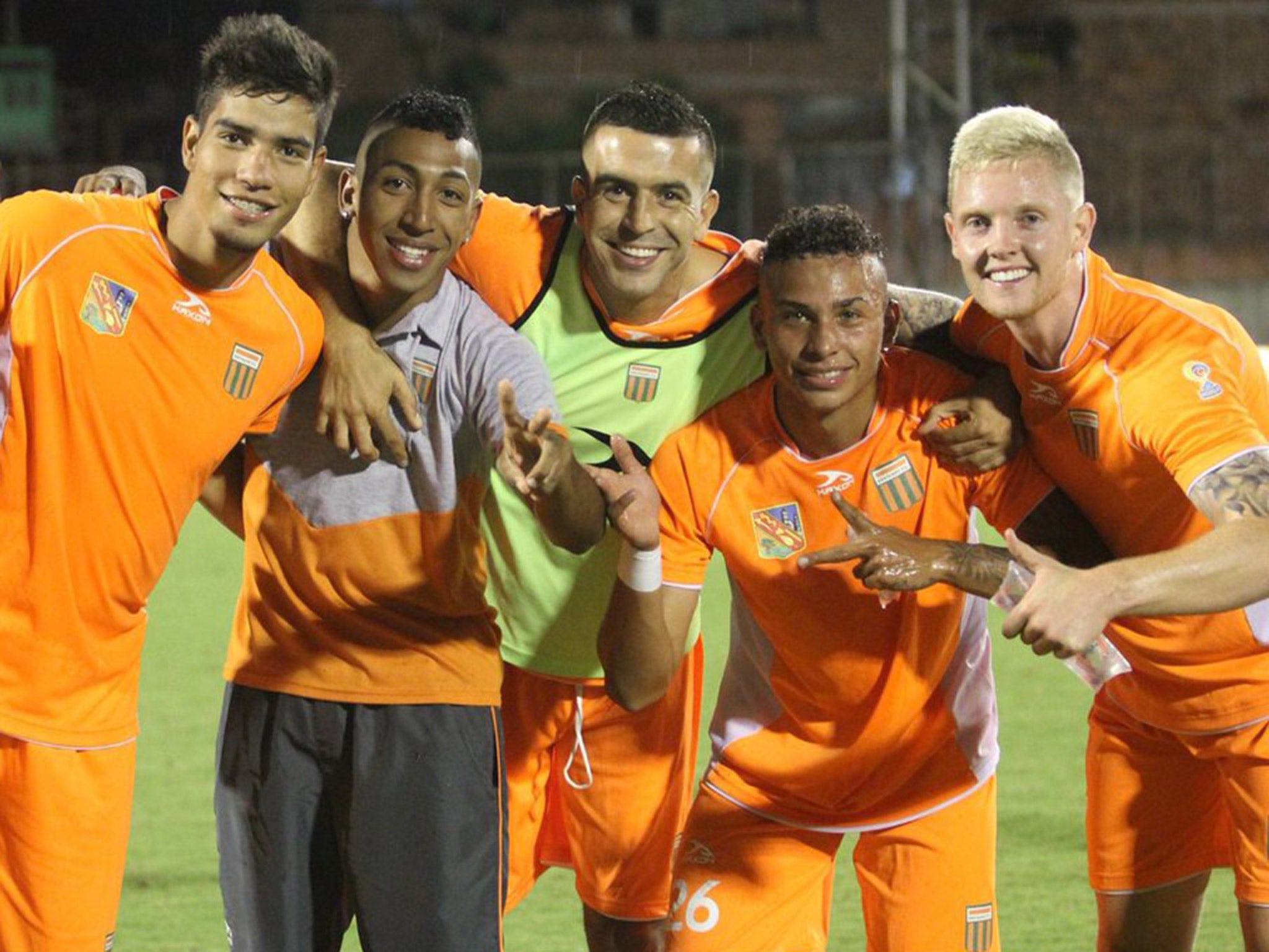 George Saunders (right) plays for Envigado in Colombia