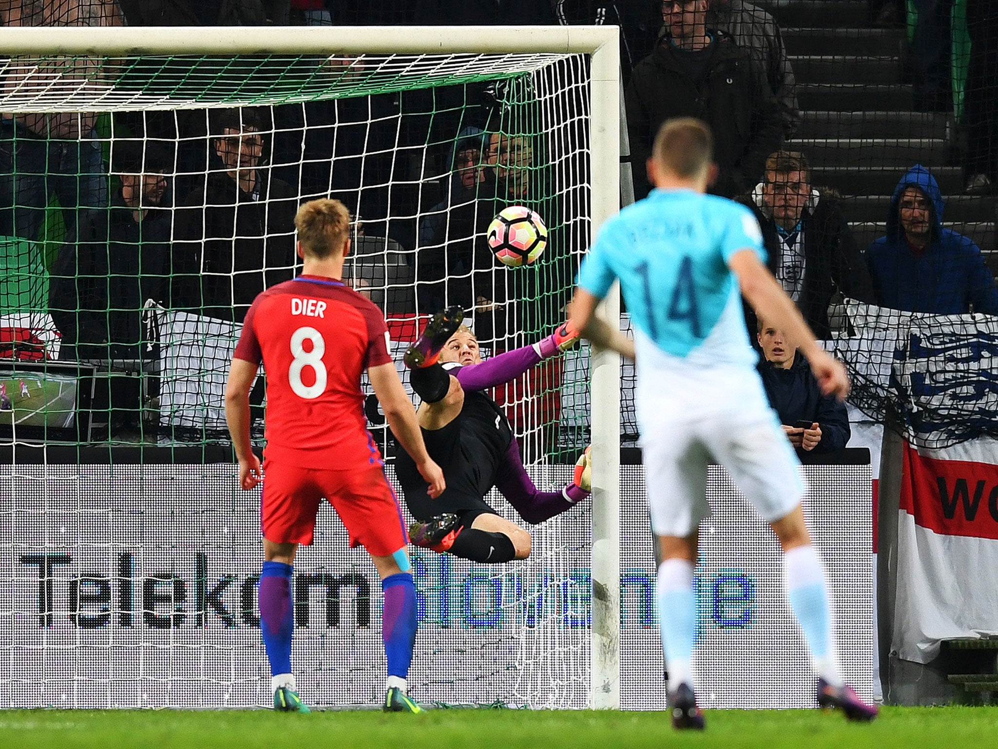 Joe Hart completes his remarkable save during the draw with Slovenia