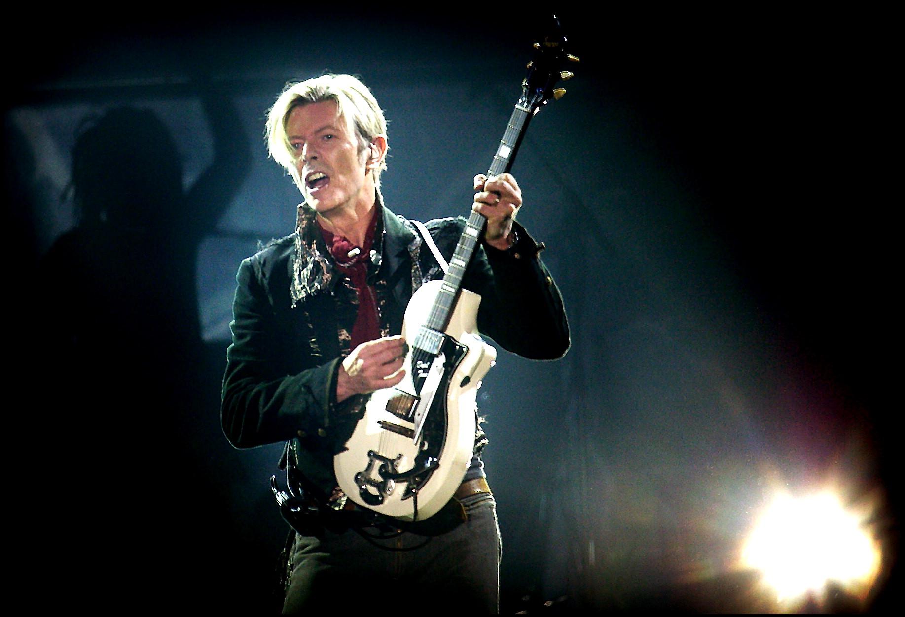 David Bowie performs on stage at the Forum in Copenhagen October 7. 2003.