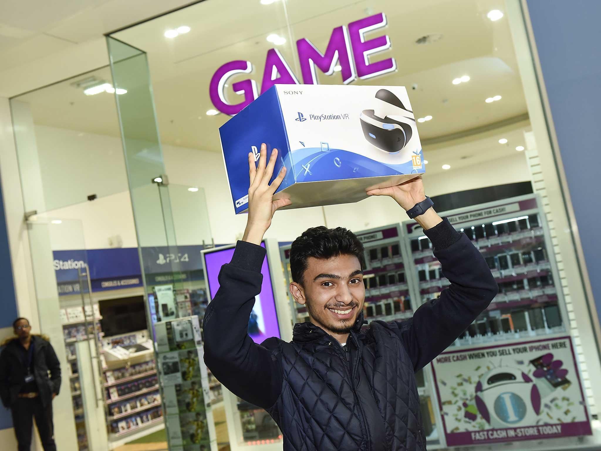 An elated customer at the launch of PlayStation VR at the GAME Digital Westfield White City midnight launch.