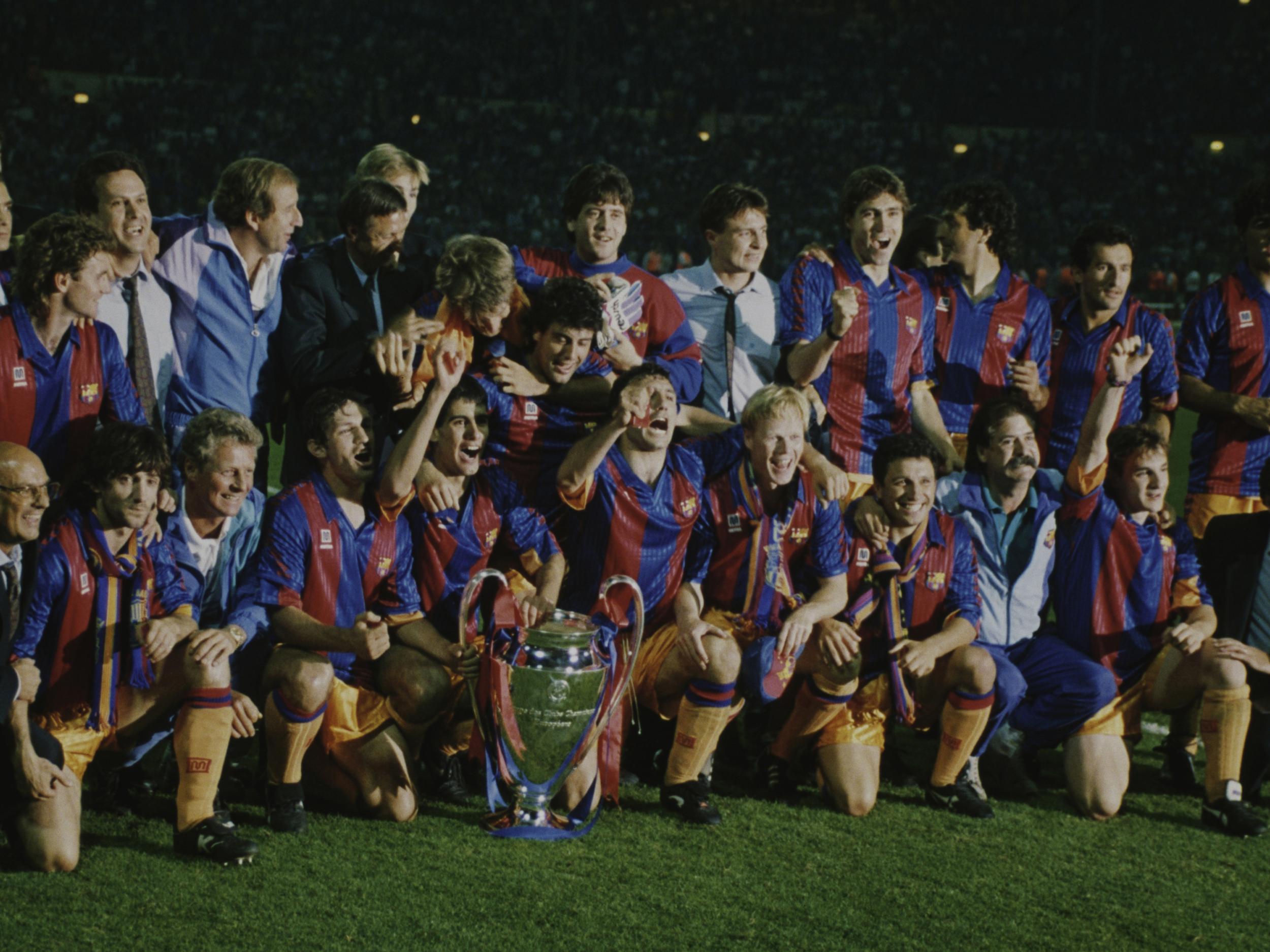 Pep Guardiola (fifth from left) and Ronald Koeman (seventh from left) celebrate Barcelona's 1992 triumph alongside Johan Cruyff