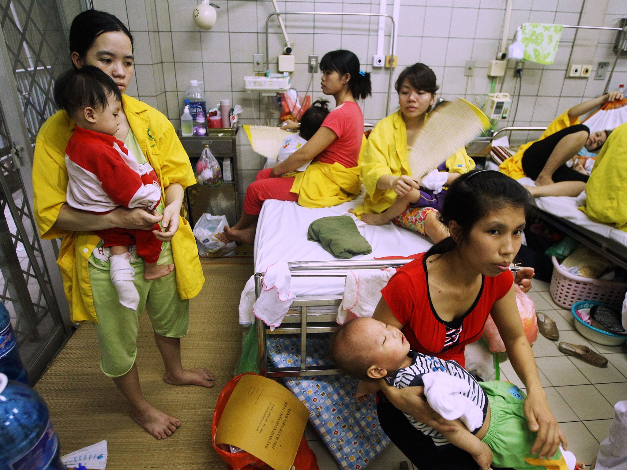 Children suffering from measles at a state-run hospital in Hanoi during the 2014 outbreak