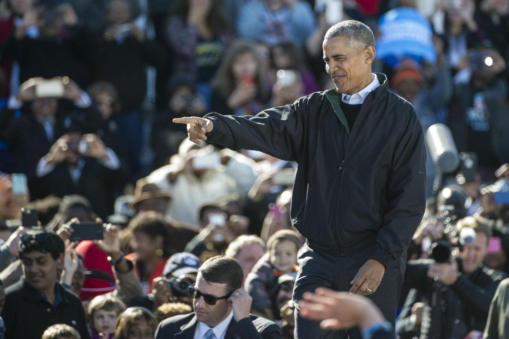 President Barack Obama on the stump for Hillary Clinton in Ohio, where she is ahead in polls by less than two per cent on average