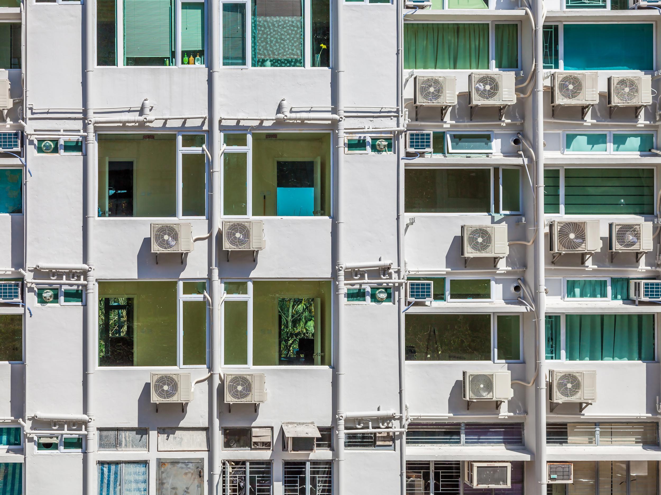 Air conditioning units on an apartment block in Hong Kong (Getty Images / iStockphoto)