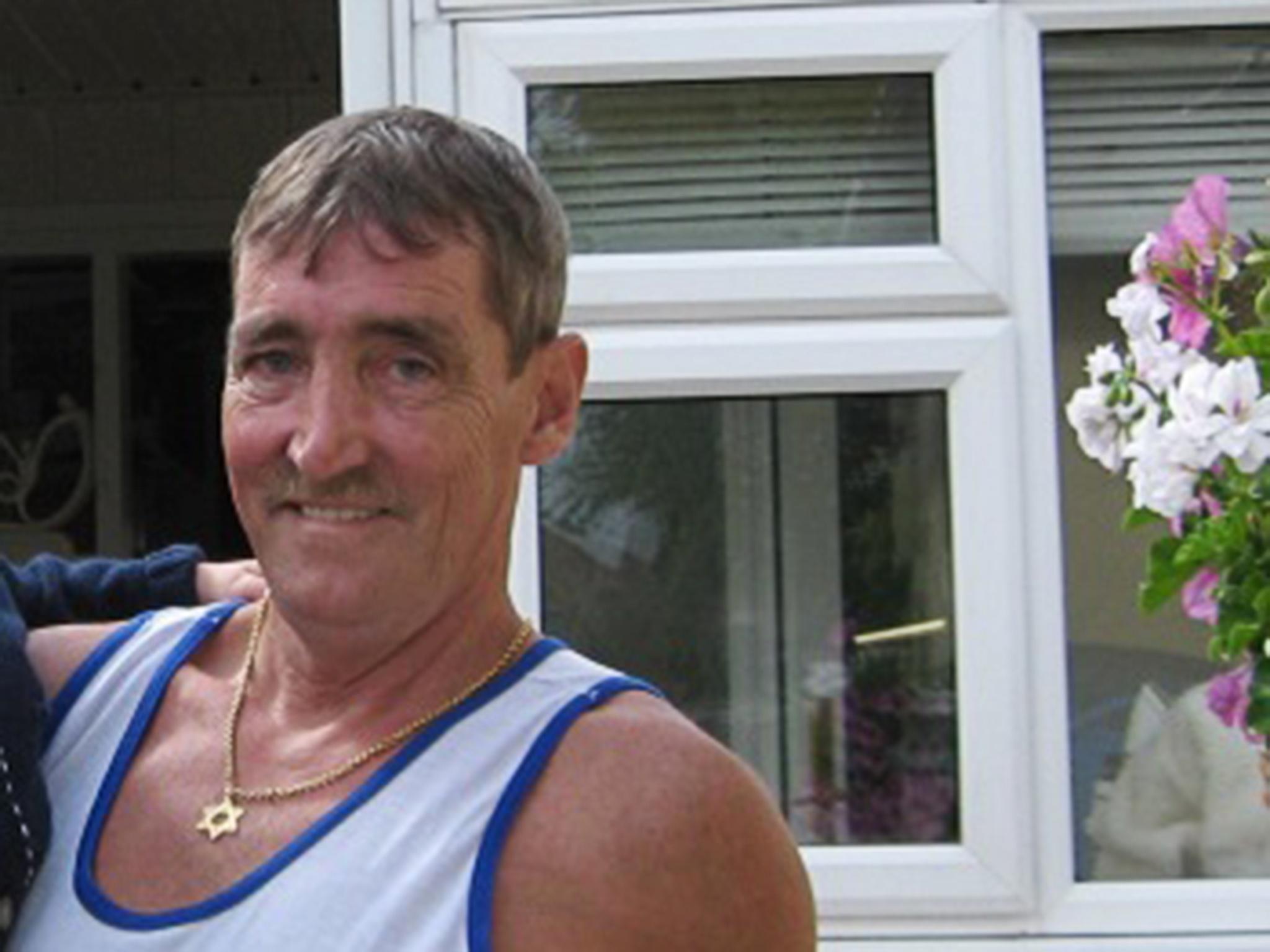 Duncan Keating was hit with a parasol and repeatedly punched by his neighbour