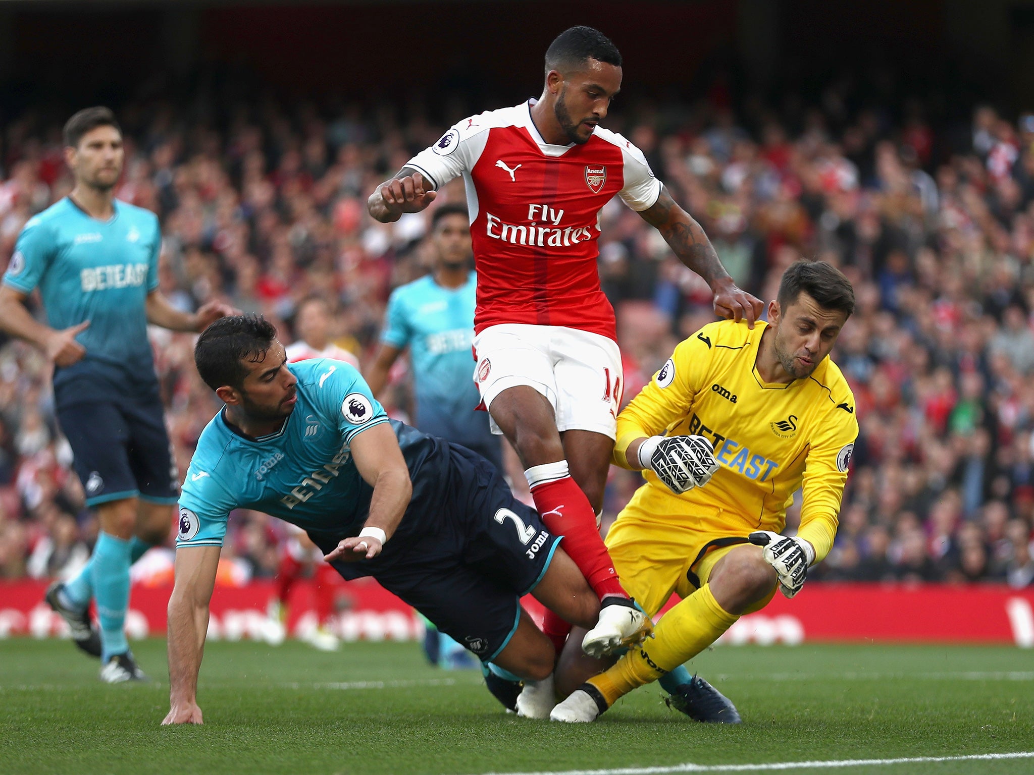 Walcott pokes home from close range against Swansea