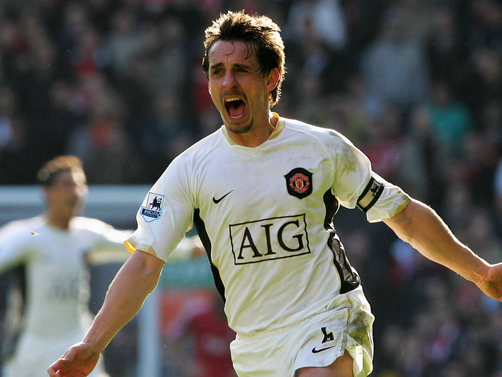 Neville celebrates John O'Shea late winner at Anfield in 2007