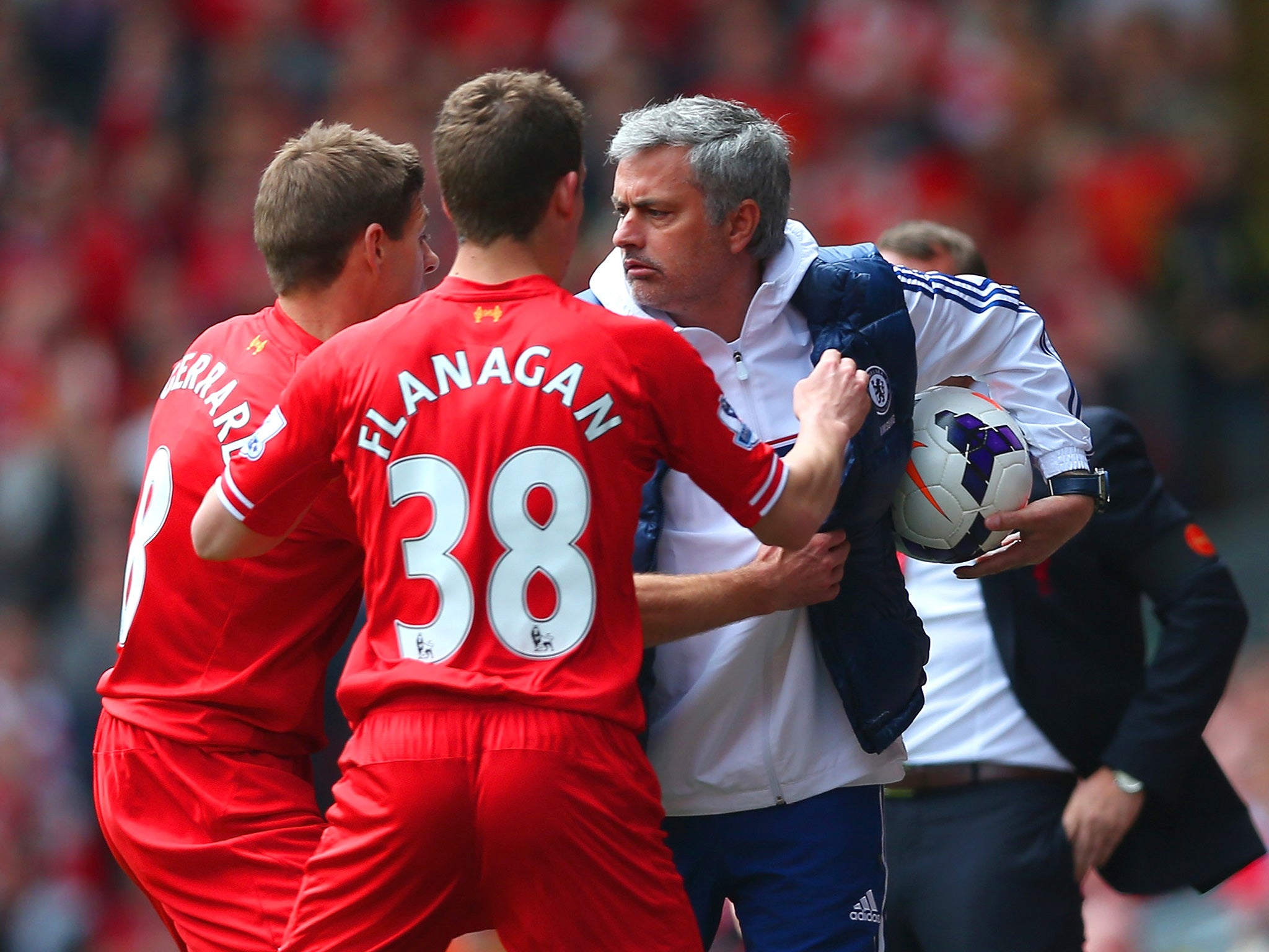 Mourinho shields the ball during Chelsea's win at Anfield in 2014