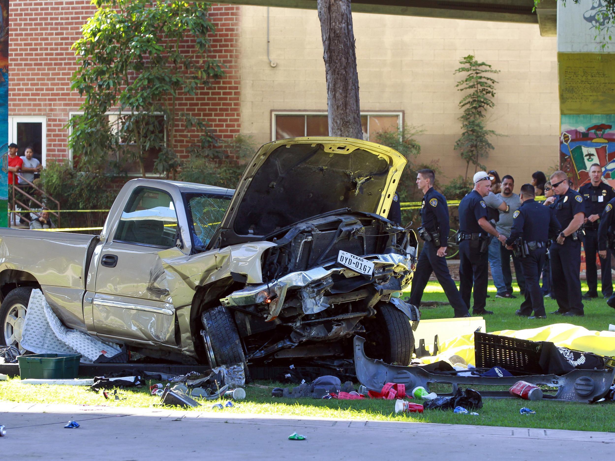 Witnesses said the truck landed on a booth set up for a popular motorcycle attraction