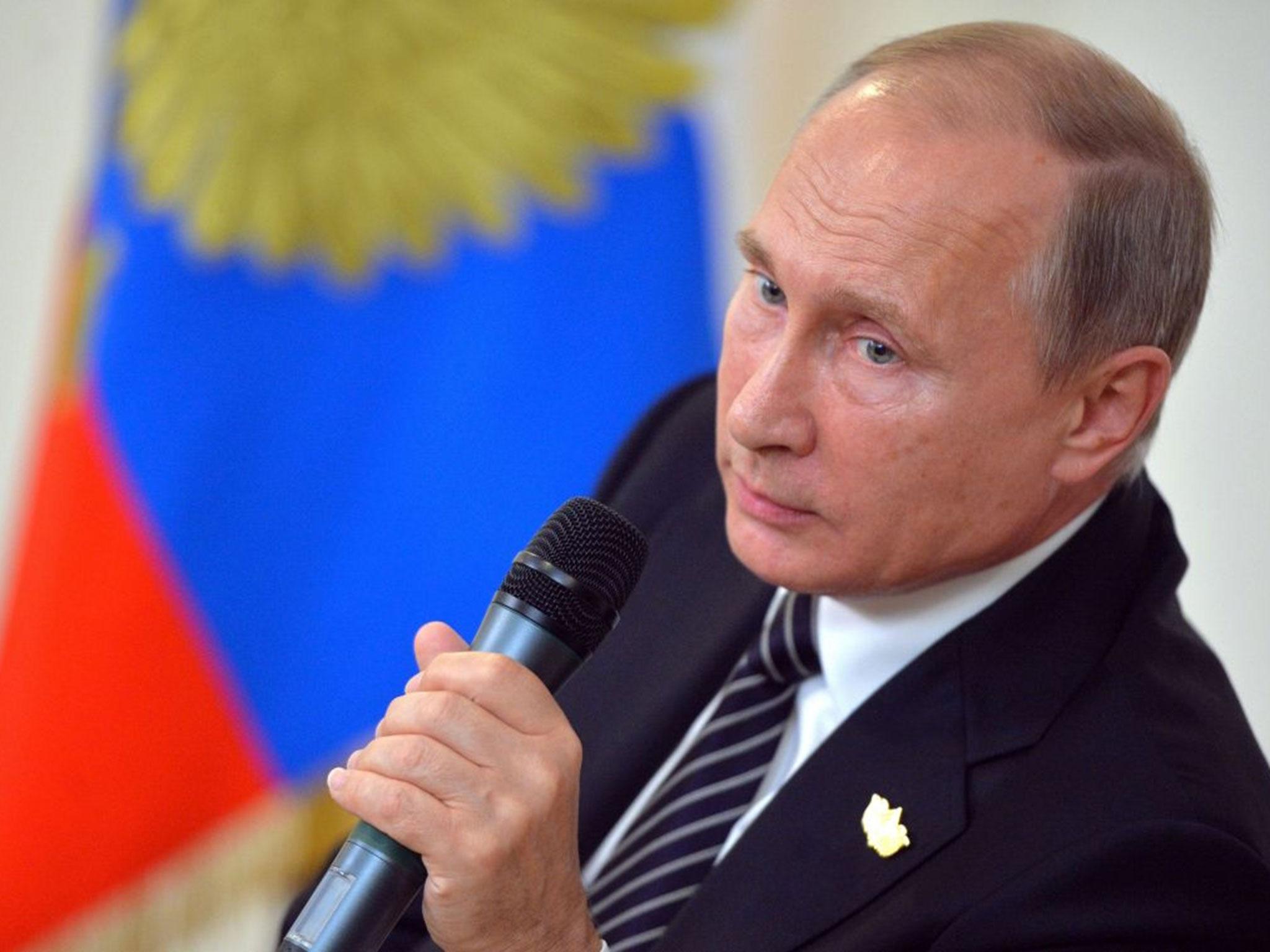 Russian President Vladimir Putin speaks to Russian journalists during a news conference after the BRICS summit in Goa, India, Sunday, 16 October, 2016