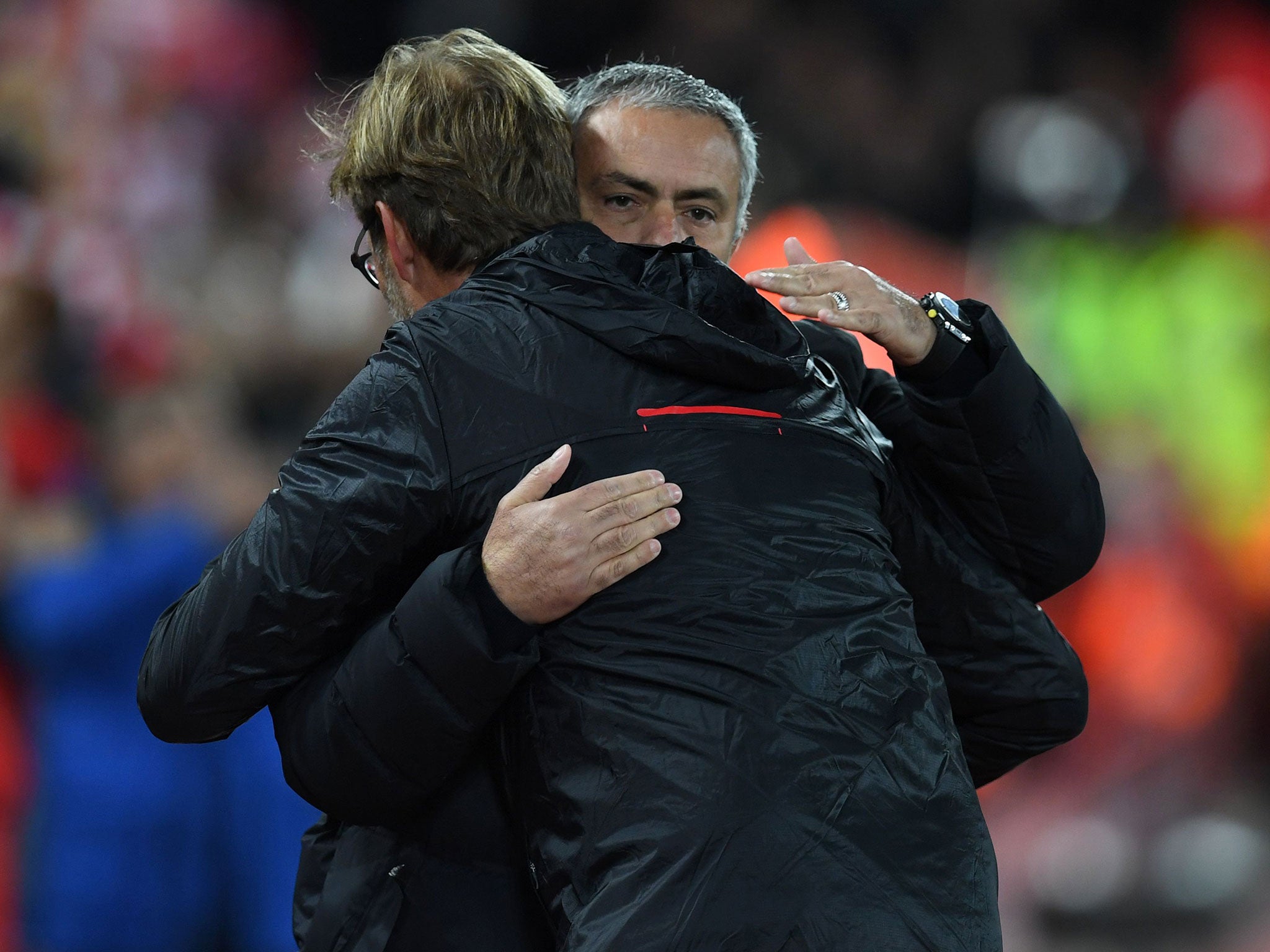 Mourinho and Klopp embrace before the starting whistle