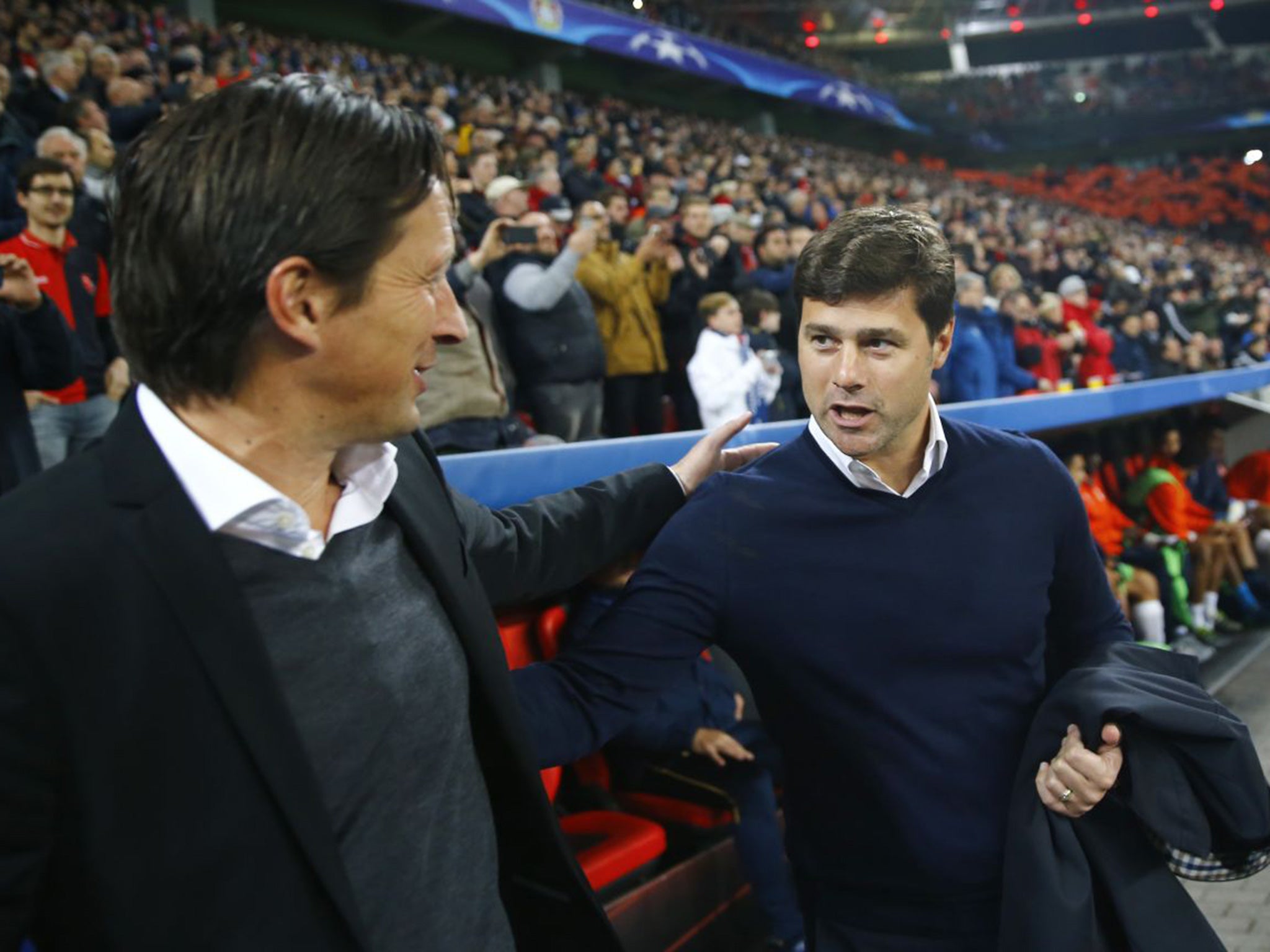 Schmidt and Pochettino greet each other before kick-off