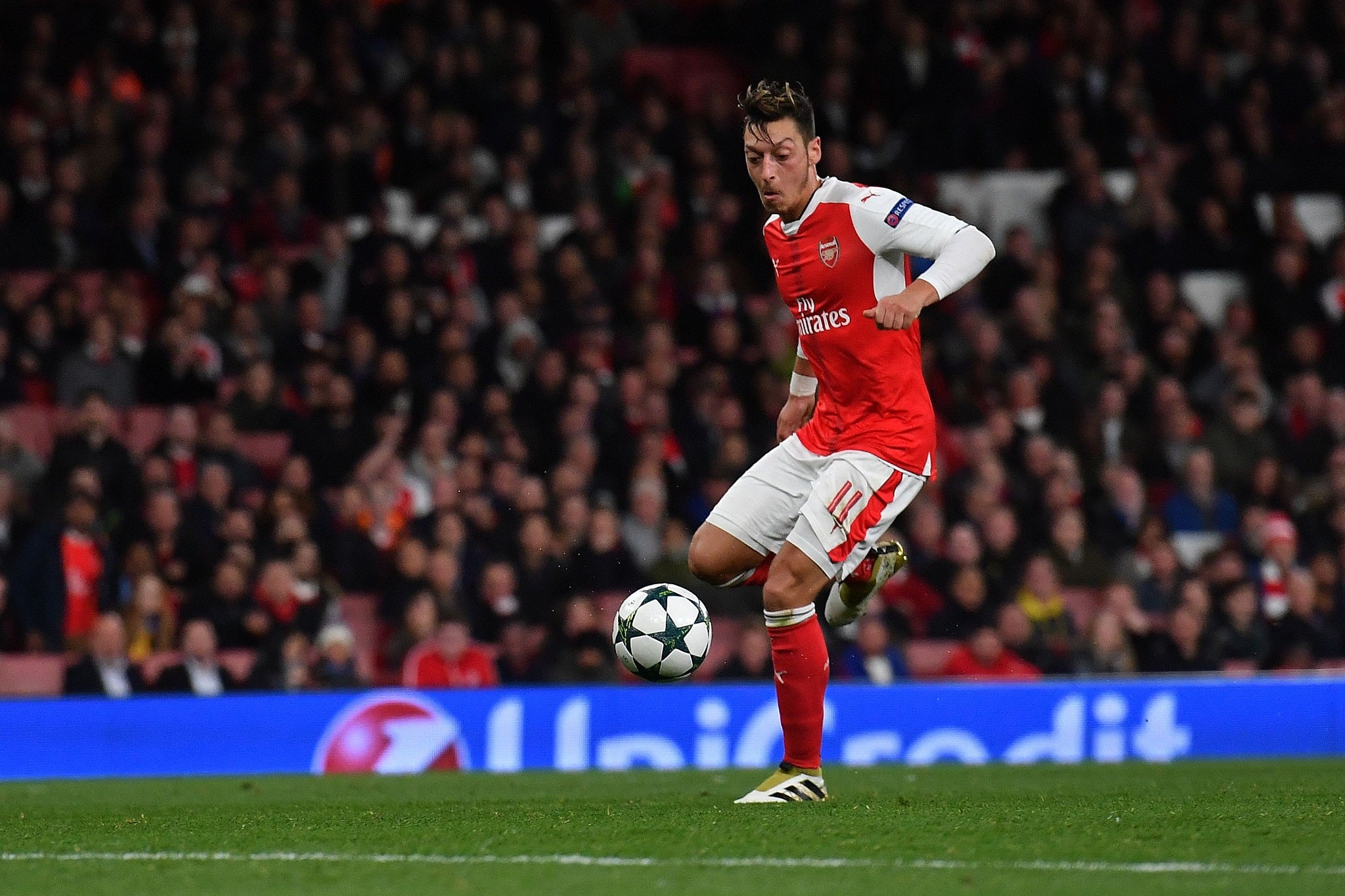 Mesut Ozil scores the second of his three goals in the 6-0 rout of Ludogorets