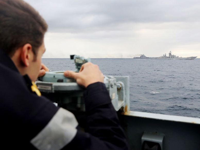 A lookout on board HMS Richmond monitors the Russian warships in the North Sea