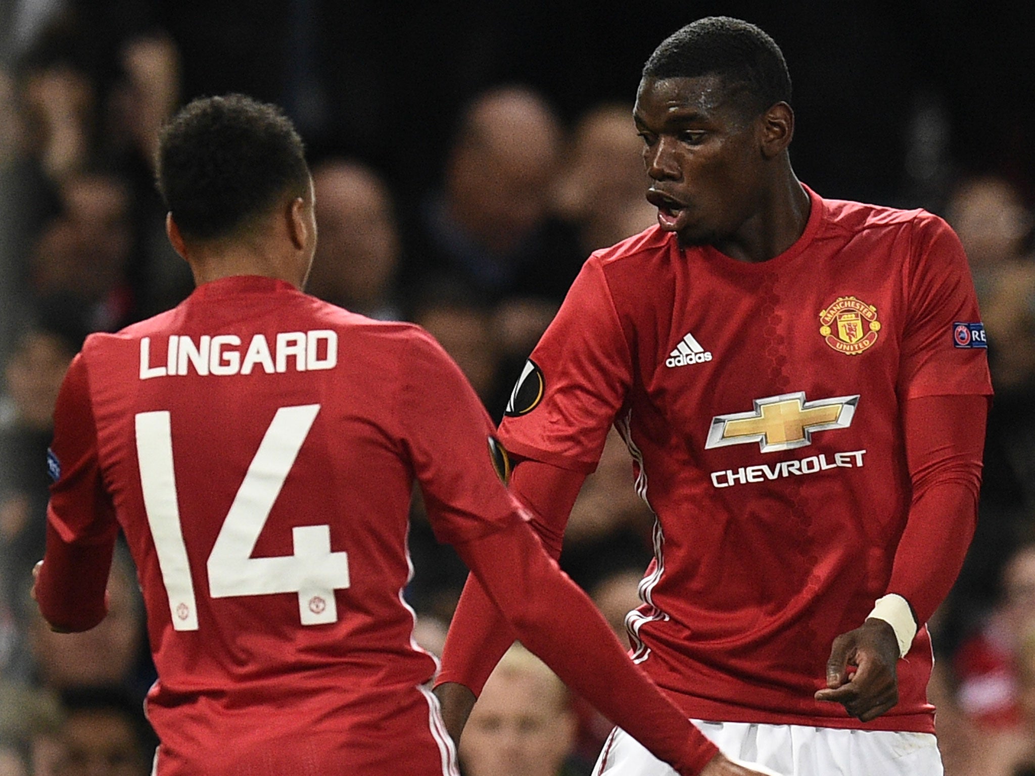 Lingard celebrates his well-taken goal with Pogba