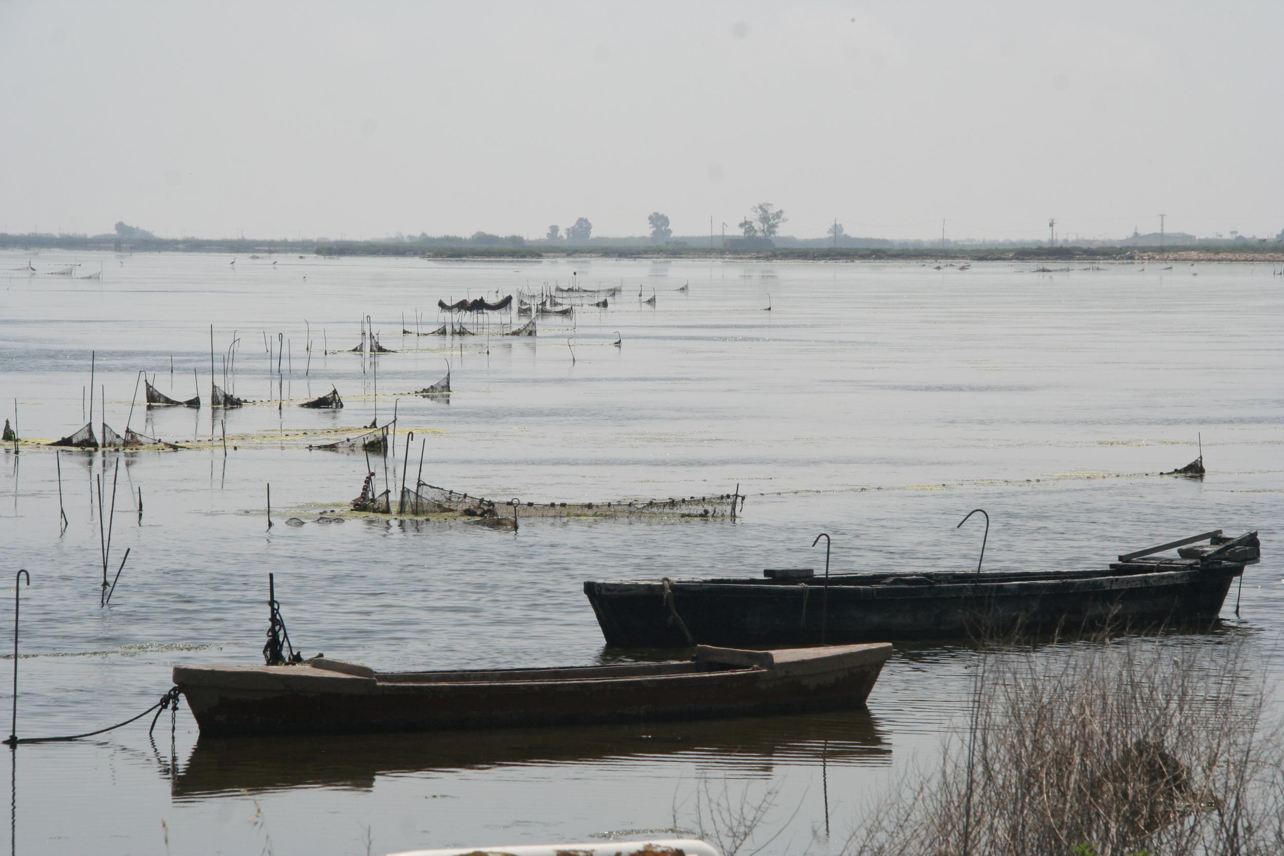 Simple fishing boats by the jetty