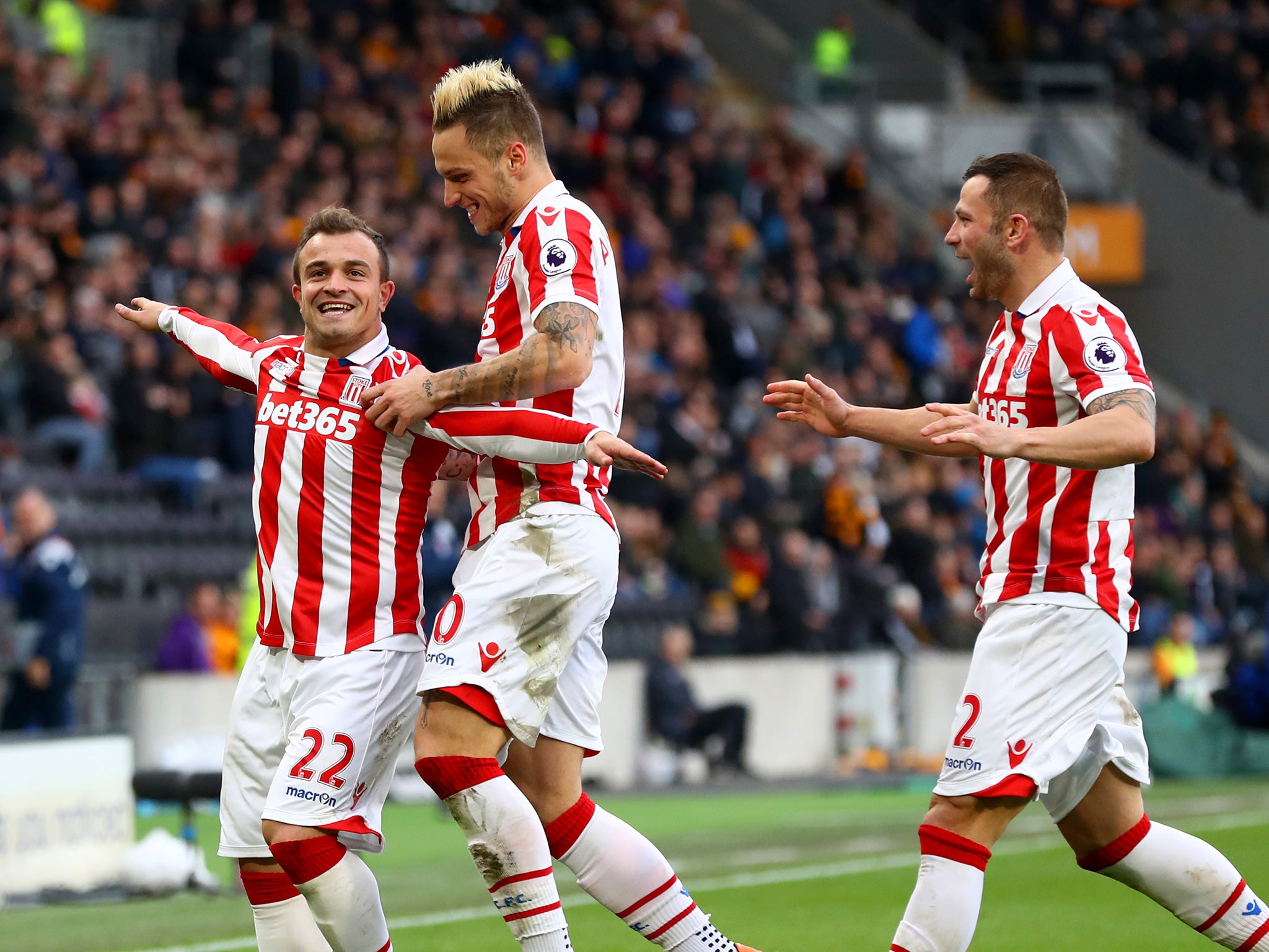 Shaqiri celebrates his second strike with team-mates