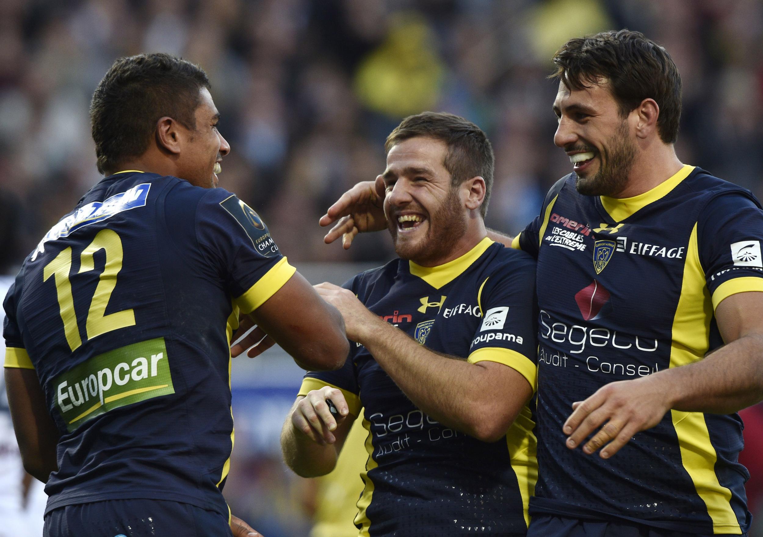 Wesley Fofana celebrates with Camille Lopez after scoring a try