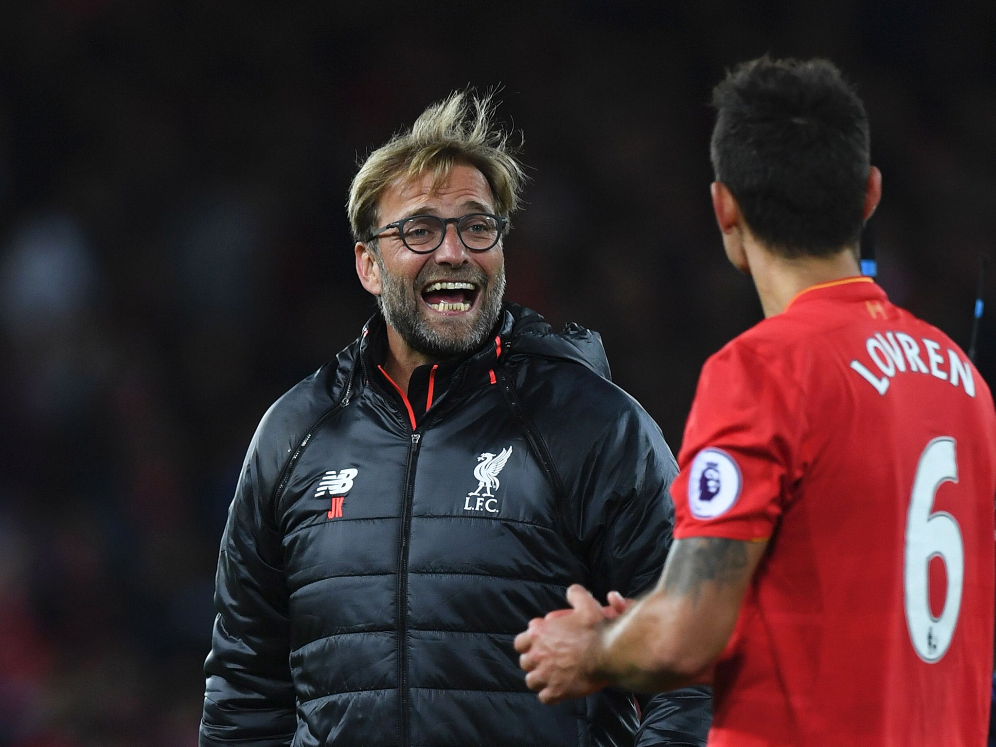 Jurgen Klopp celebrates with Dejan Lovren after Liverpool's 2-1 win over West Brom