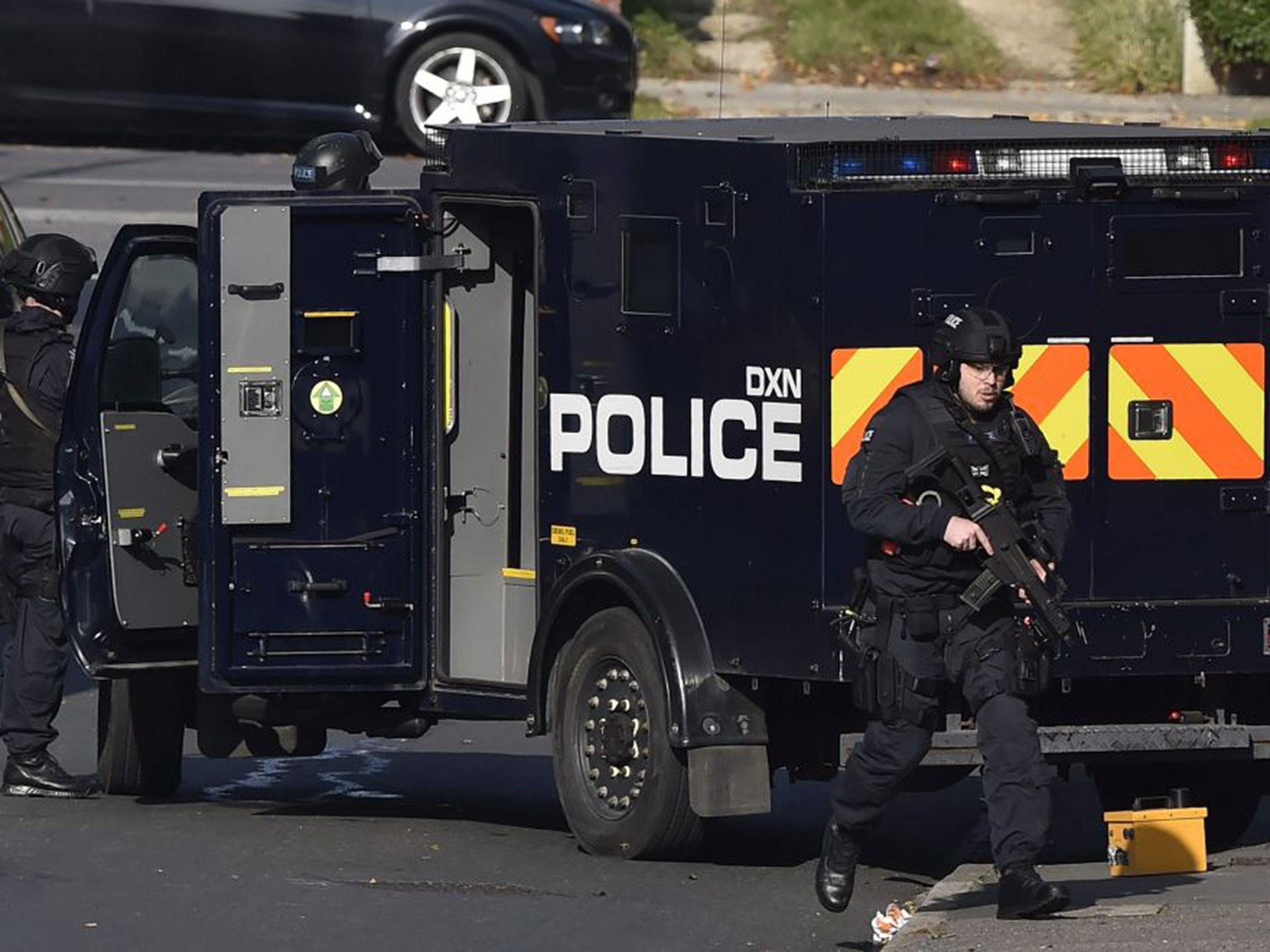 Armed officers at the siege of the stand off in Northolt